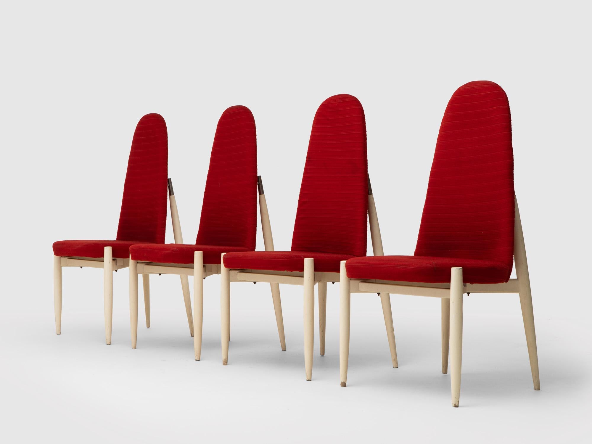 Set of 4 dining chairs by Miroslav Navratil, 1970s. Red upholstered seat and white painted structure. Original condition, upholstery to be updated. White painted wood construction with some paint looses on the leg ends.