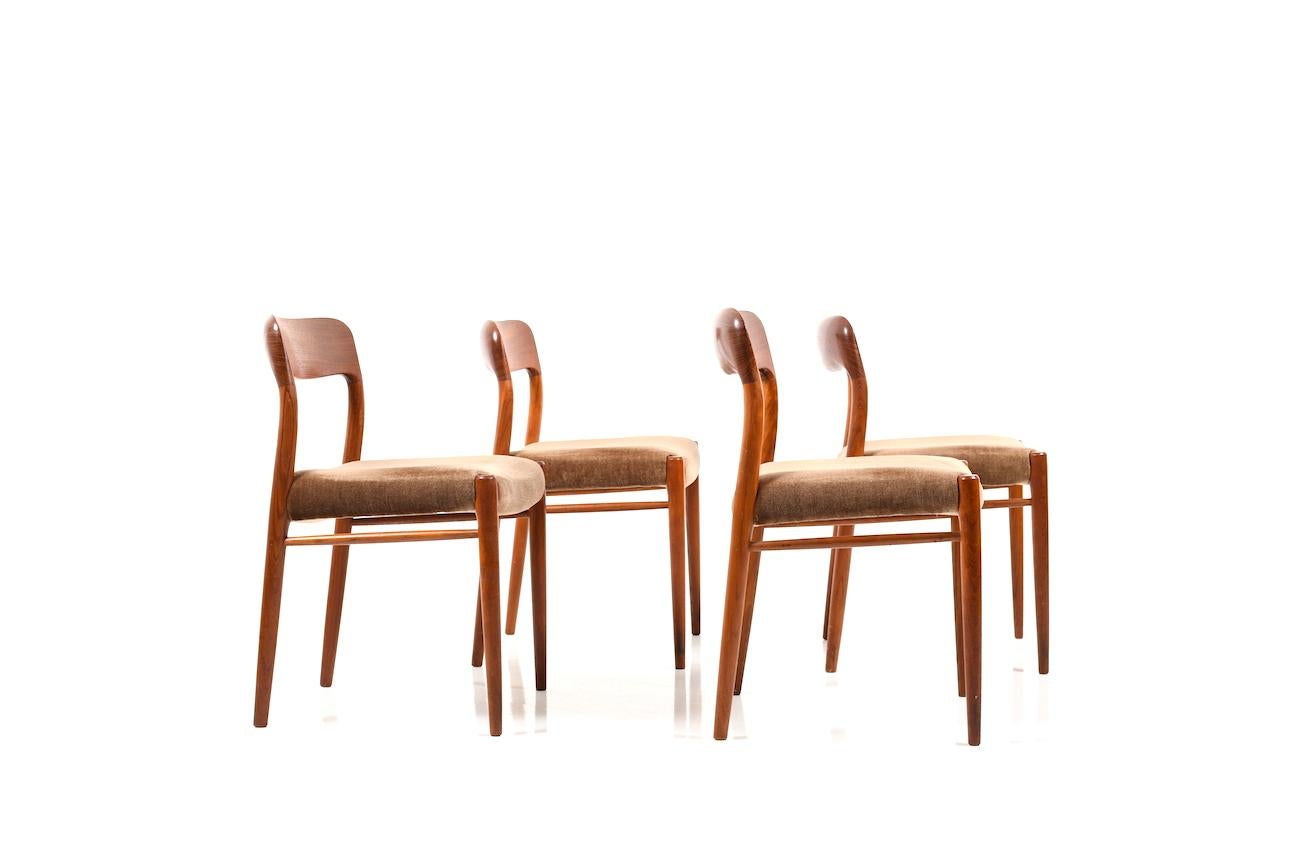 Set of 4 dining chairs in solid teak by Niels O. Møller. Model no.75. Seats in brown mohair fabric. Produced by J.L. Møllers Møbelfabrik.