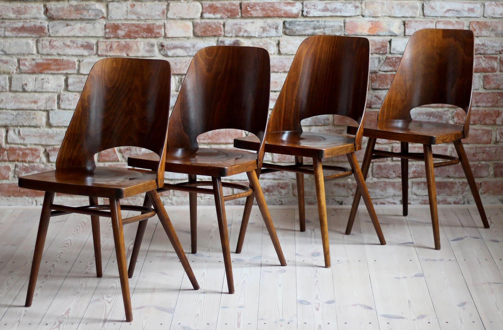 Set of 4 chairs designed by Radomir Hofman for TON, Model 514. The chairs are in very good original condition, have been cleaned and are ready to use. They are veneered with beechwood. Beautiful set for a coffee shop or a small restaurant! More