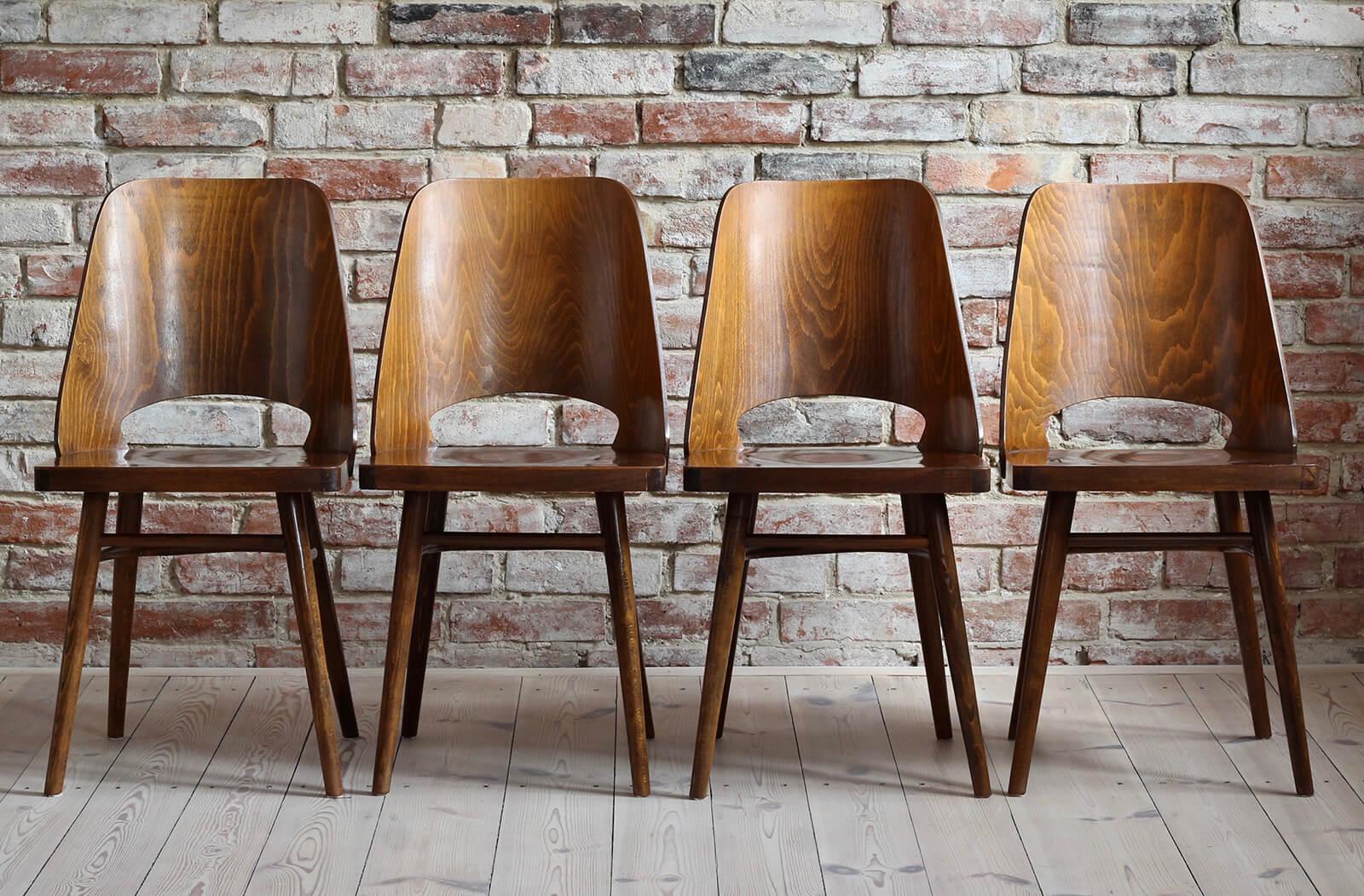 Set of 4 chairs designed by Radomir Hofman for TON, Model 514. The chairs are in very good original condition, have been cleaned and are ready to use. They are veneered with beechwood. Beautiful set for a coffee shop or a small restaurant! More