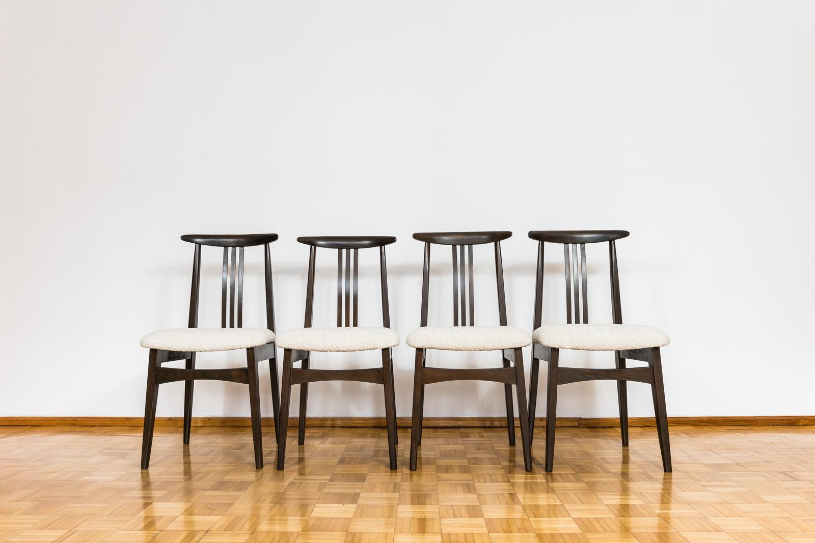 Set of 4 dining chairs designed by M. Zieliński 1960's. Poland.
Reupholstered chairs in beige boucle type of fabric, wood have been completely restored and refinished.