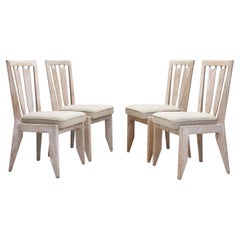 Ensemble de 4 chaises de salle à manger à dossiers ajourés en chêne chauffé, France, années 1960