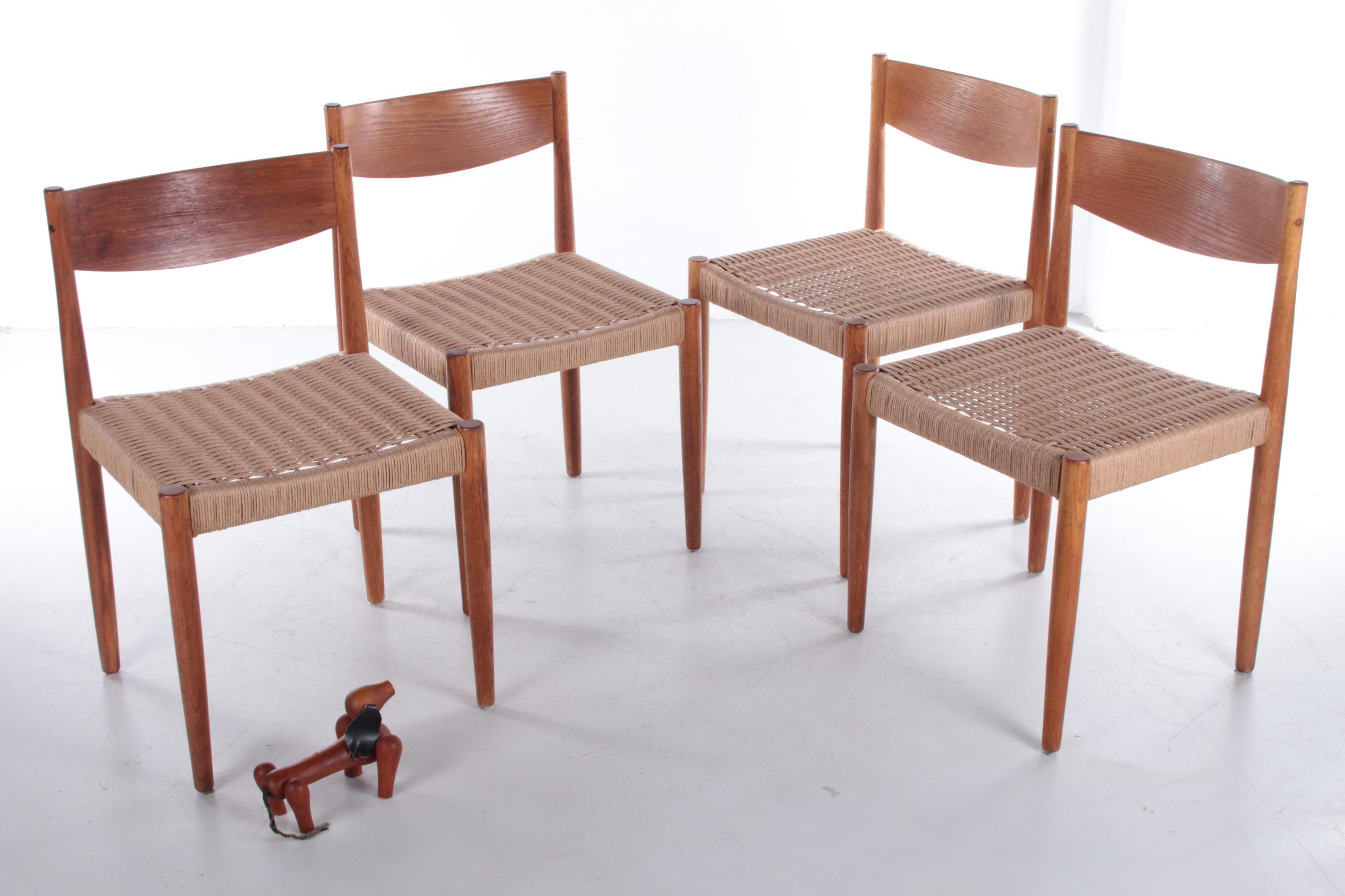 Set of 4 dining room chairs by Poul Volther for Frem Røjle, 1960s

A beautiful set of four dining room chairs from the 1960s. The design comes from the famous Danish designer Poul Volther for the furniture brand Frem Røjle.

The chair consists