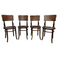 Used Set of 4 dining room chairs by Thonet Mundus