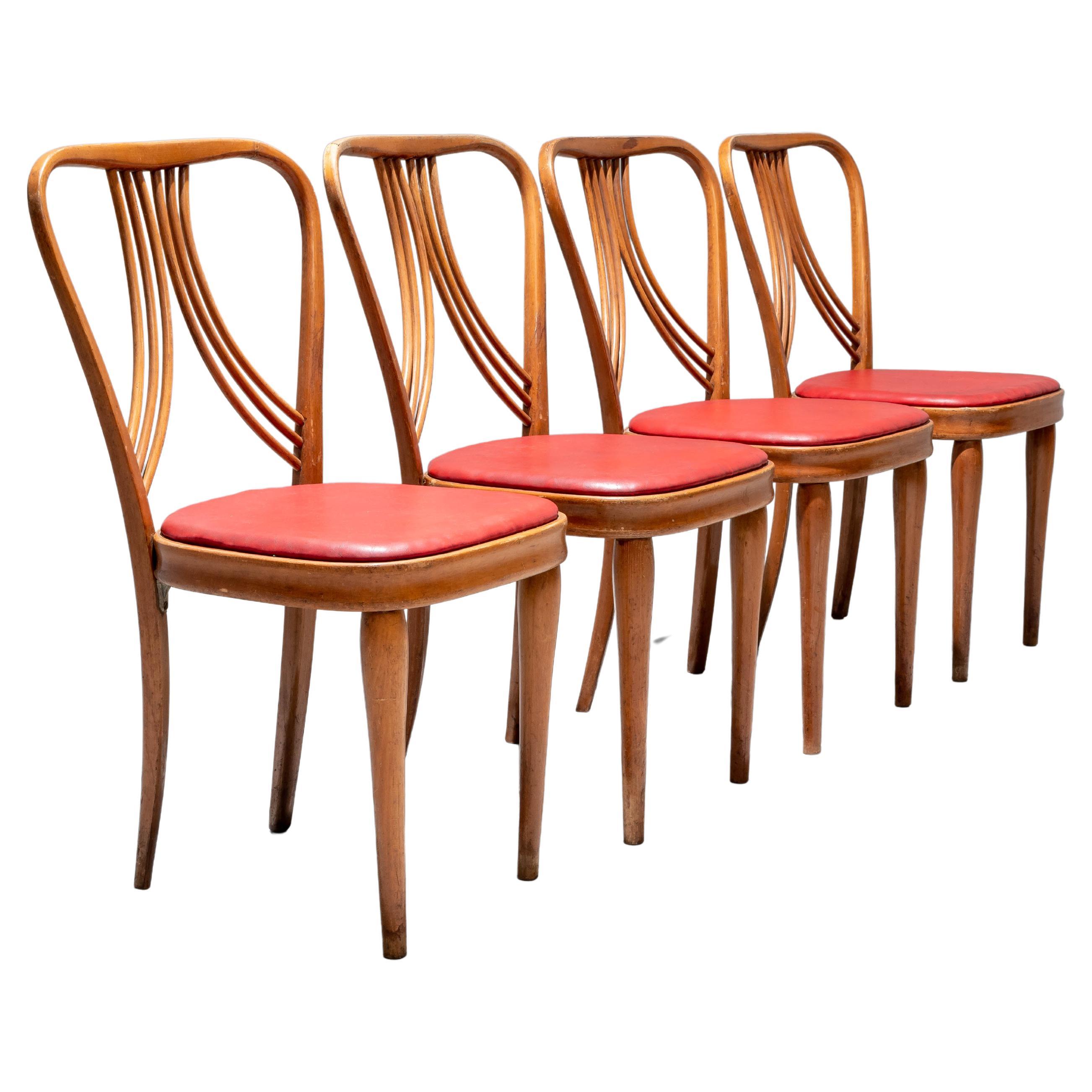 Ensemble de 4 chaises de salle à manger en bois blond et faux cuir rouge, Italie, années 1950 en vente