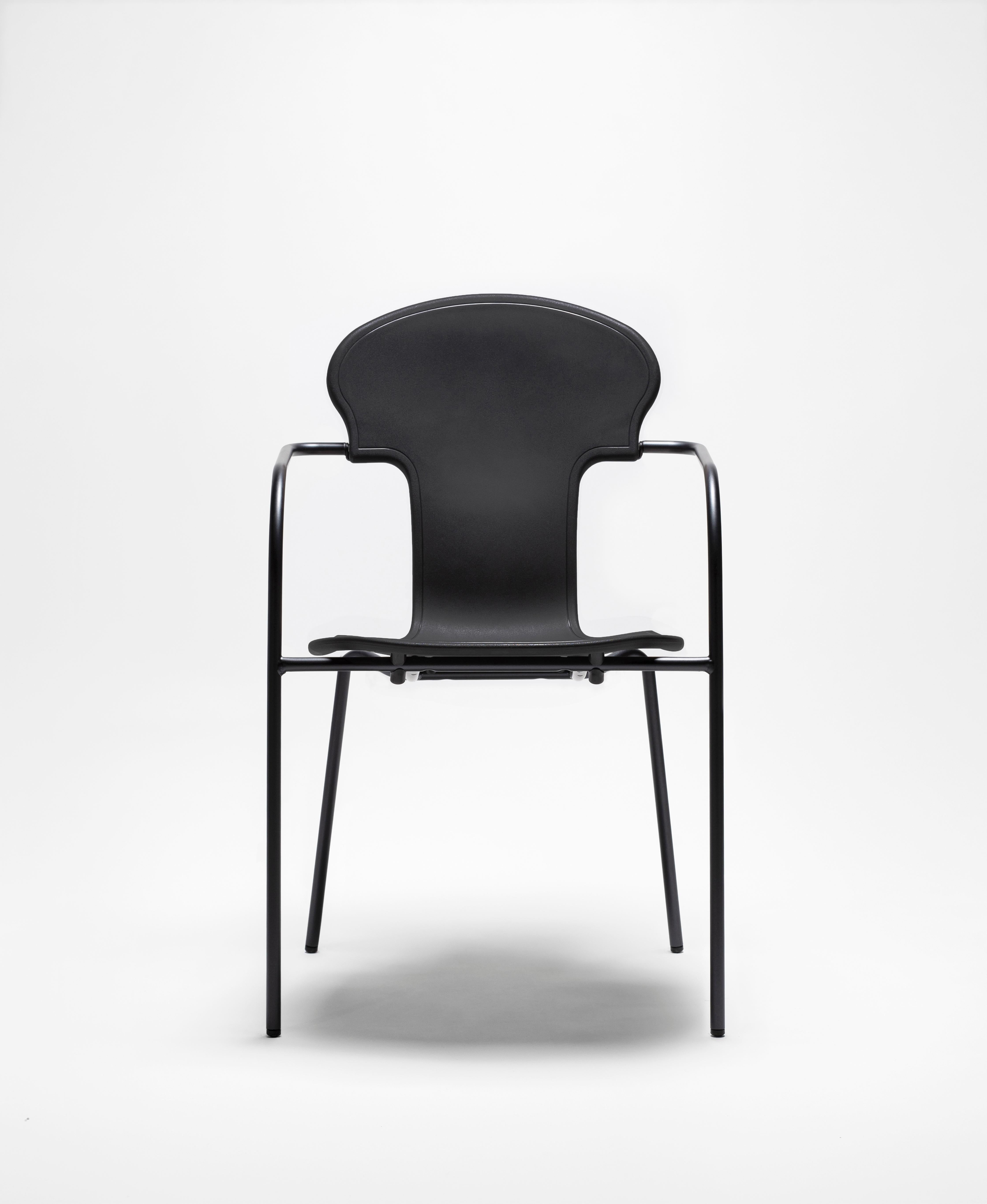 Modern Set of 4 black plastic stackable chairs with metal frame by Oscar Tusquets  For Sale
