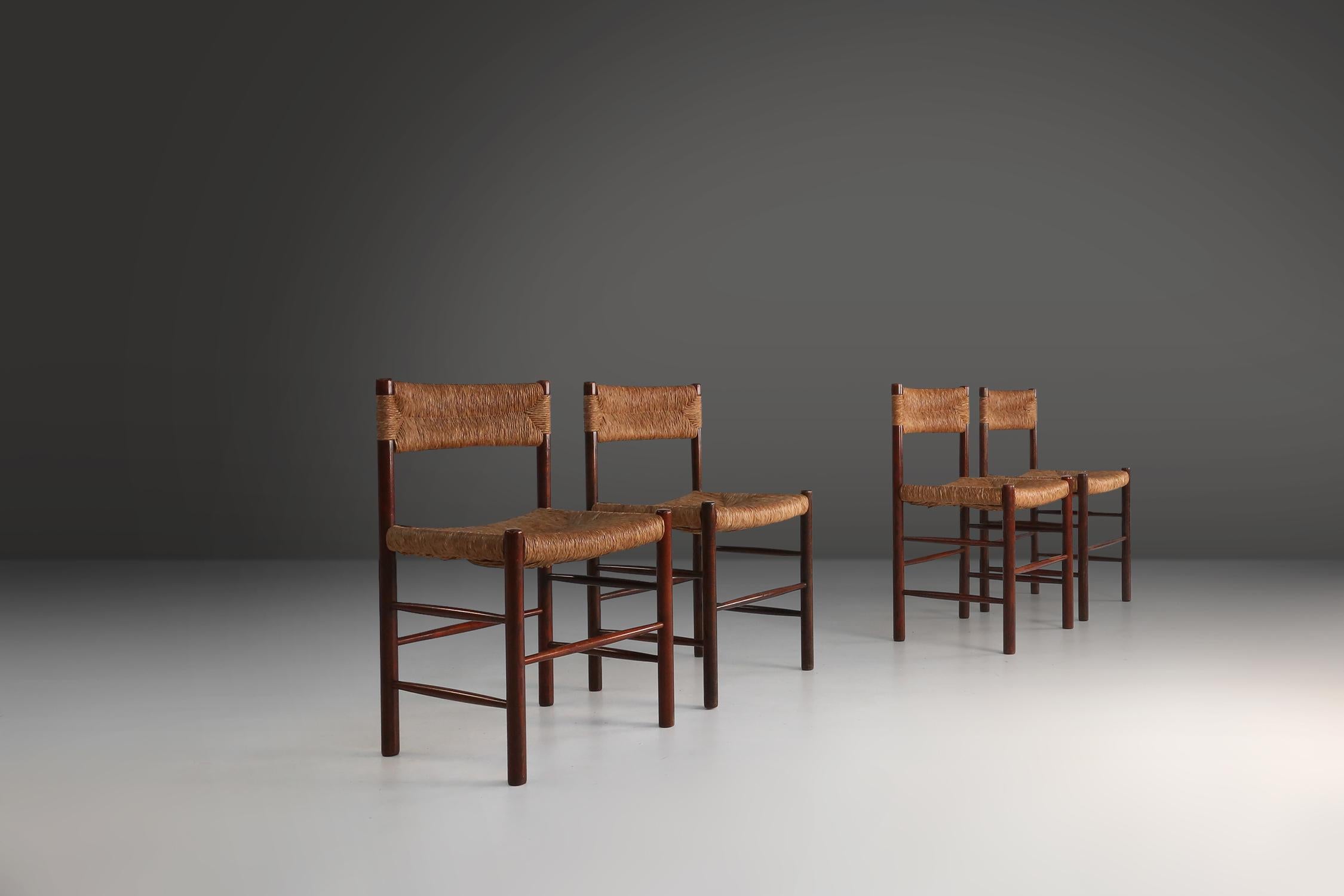 France / 1950s / 4 Dordogne chairs / Charlotte Perriand / Sentou / wicker and wood / design classic / mid-century

Set of 4 iconic Dordogne chairs by Charlotte Perriand for Sentou, France, 1950s. These exquisite chairs are a true testament to the