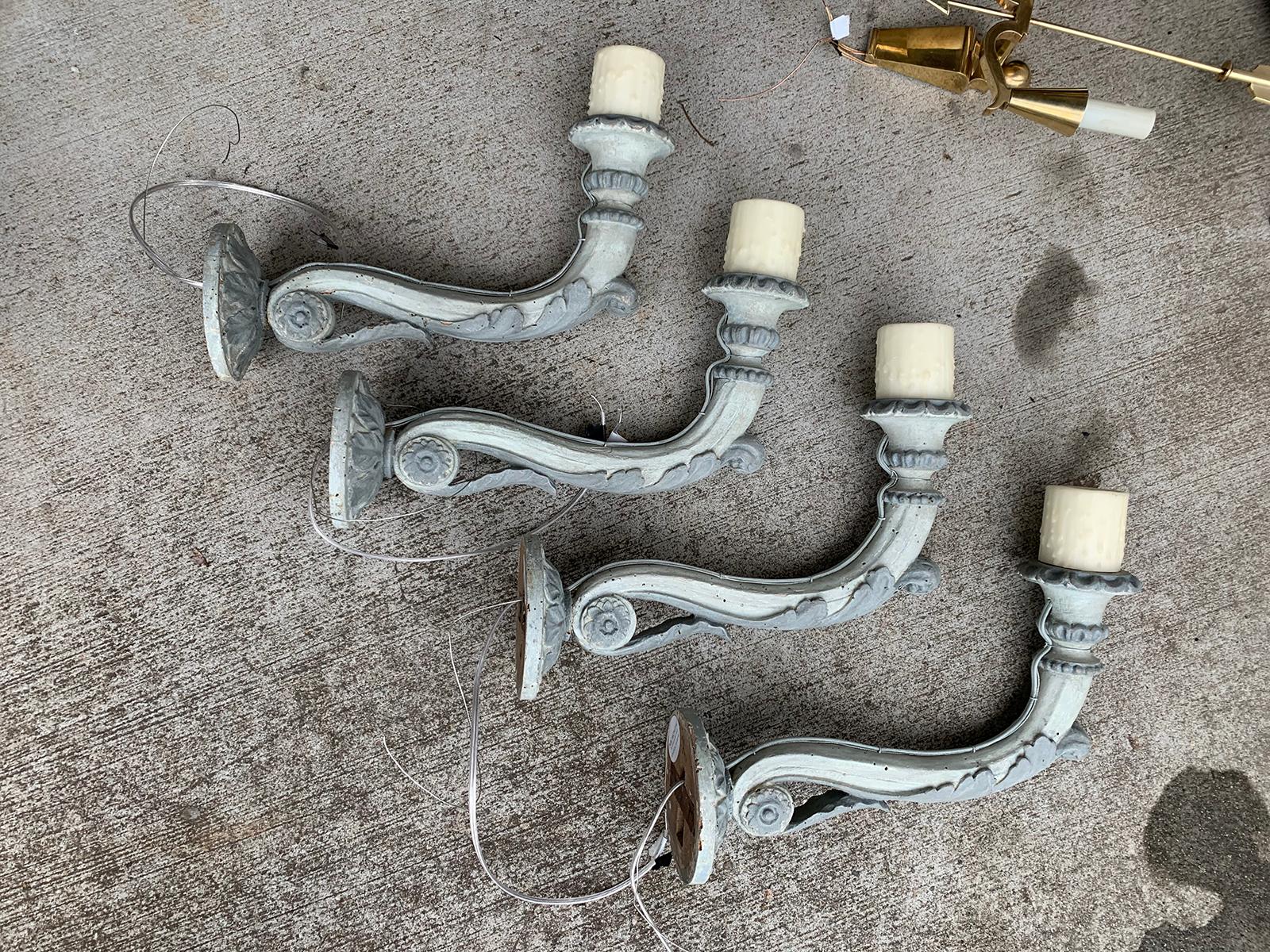 Set of four early 19th century Italian hand carved one-arm sconces
Custom painted finish
Brand new wiring. French wired.