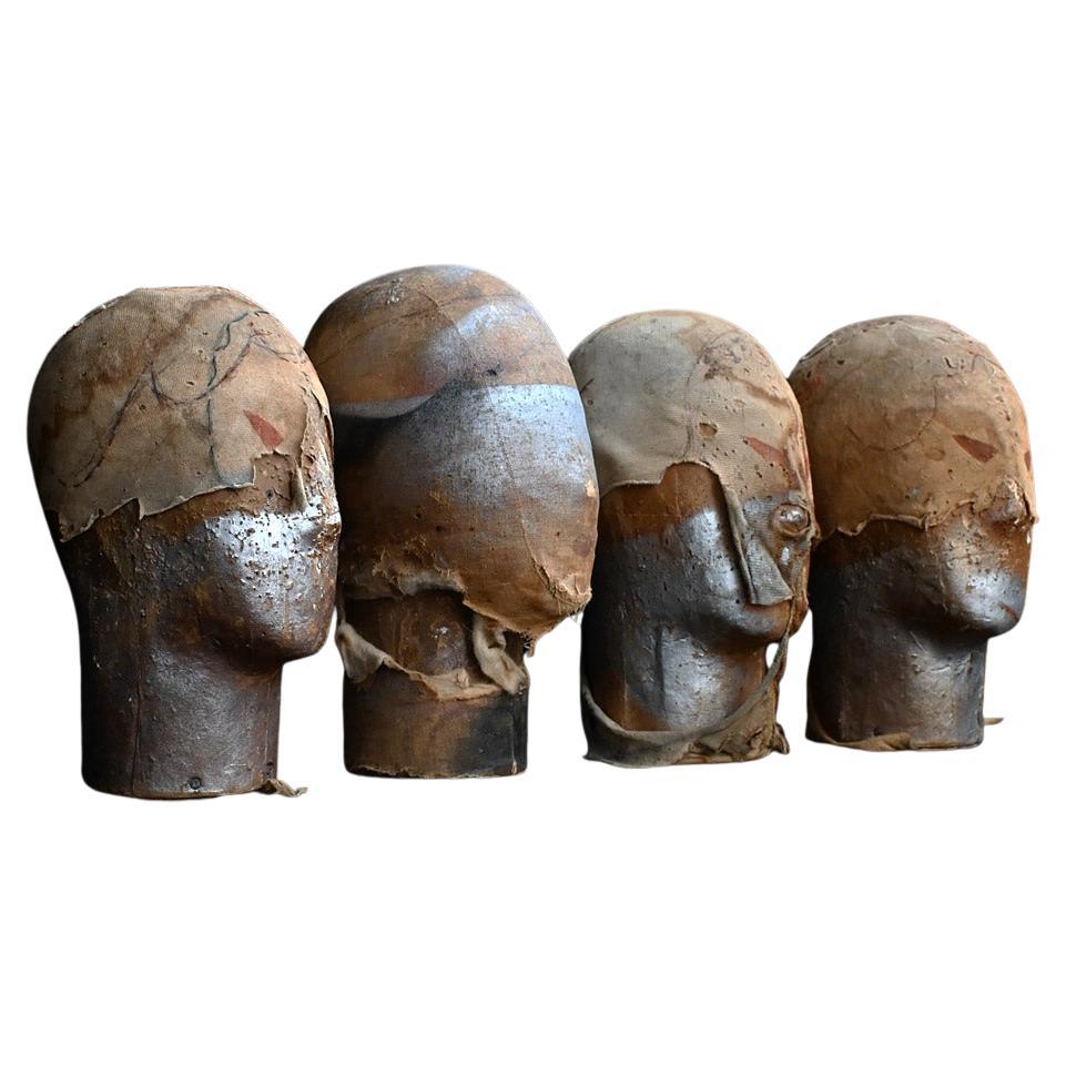 Juego de 4 cabezas de sombrerero de principios del siglo XX en venta