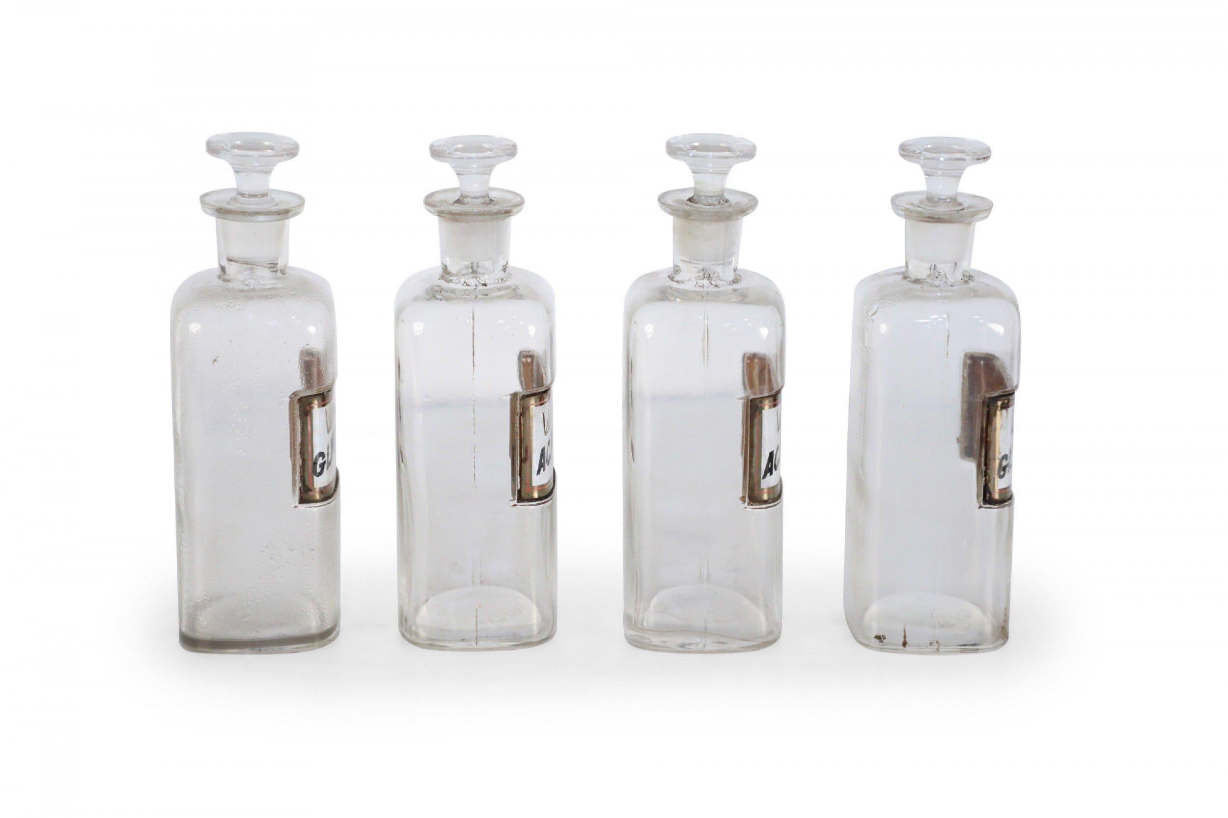 American Set of 4 Early 20th Century Labeled Glass Apothecary Bottles For Sale