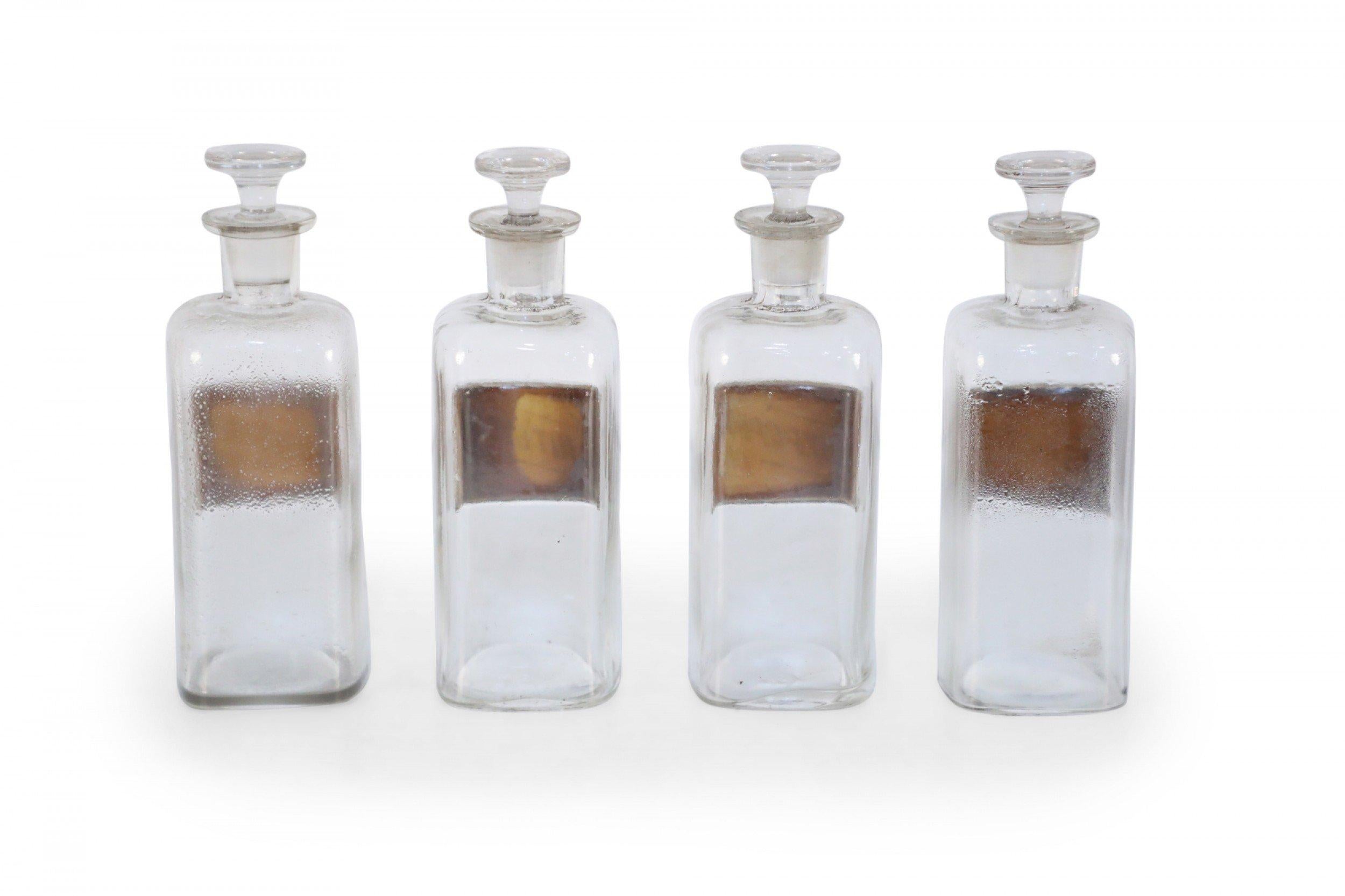 Set of 4 Early 20th Century Labeled Glass Apothecary Bottles For Sale 1