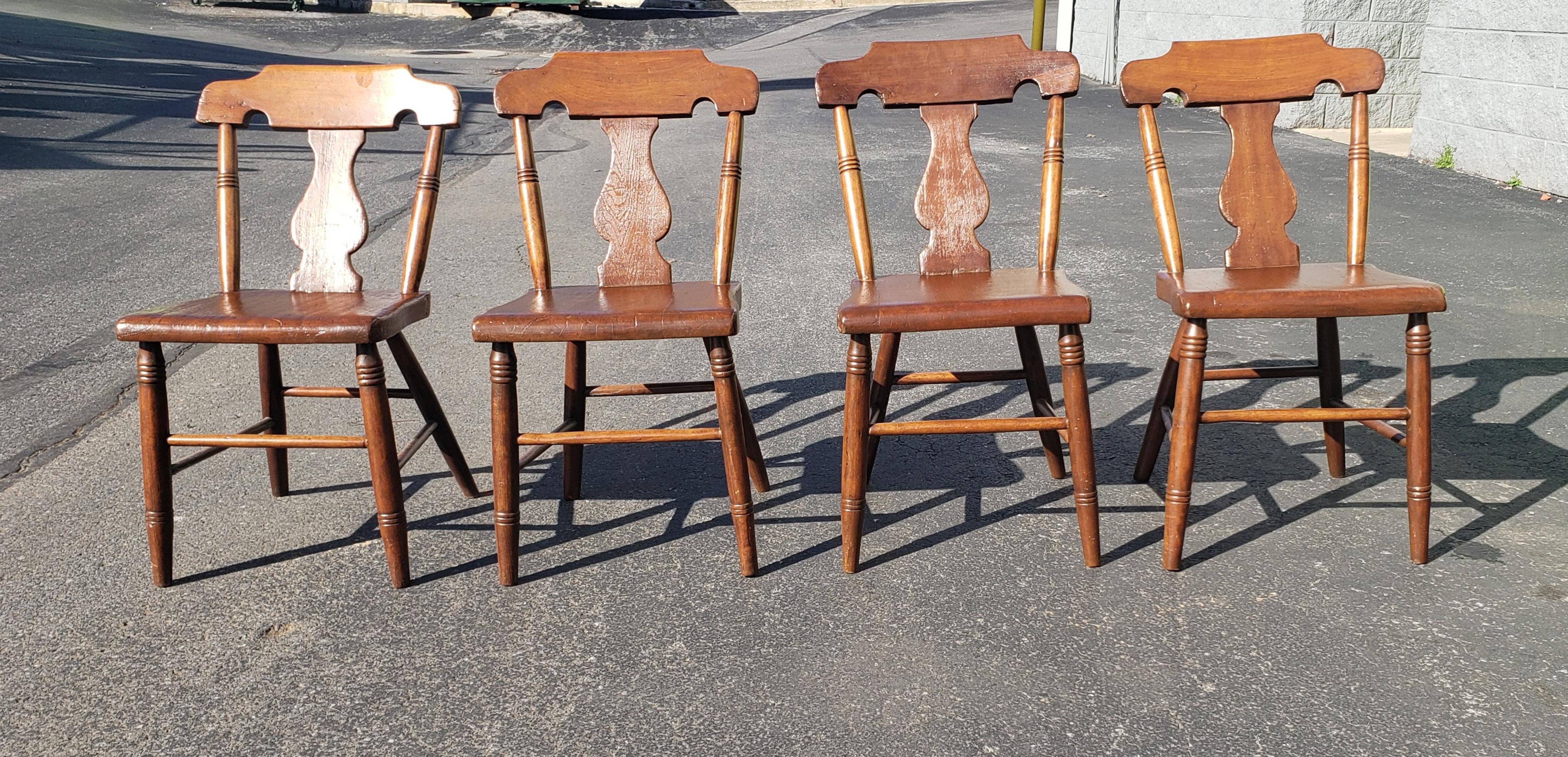 A set 4 early American yew wood side chair. Very sturdy and in good condition.