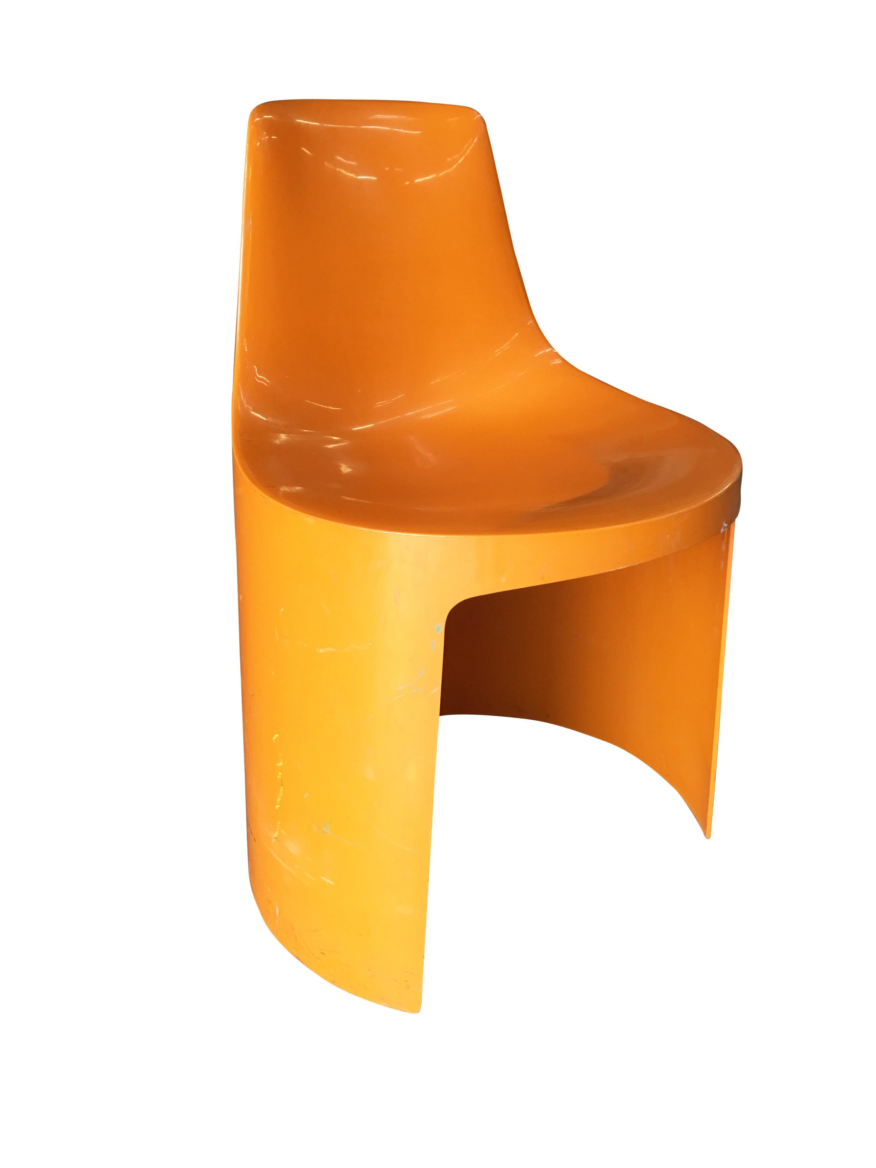 Set of 4 early 1960s Swedish designed orange plastic stacking side chairs by Overman. The Overman Company began production in Sweden, before relocating (under the same name) to Lüneburg, Germany.