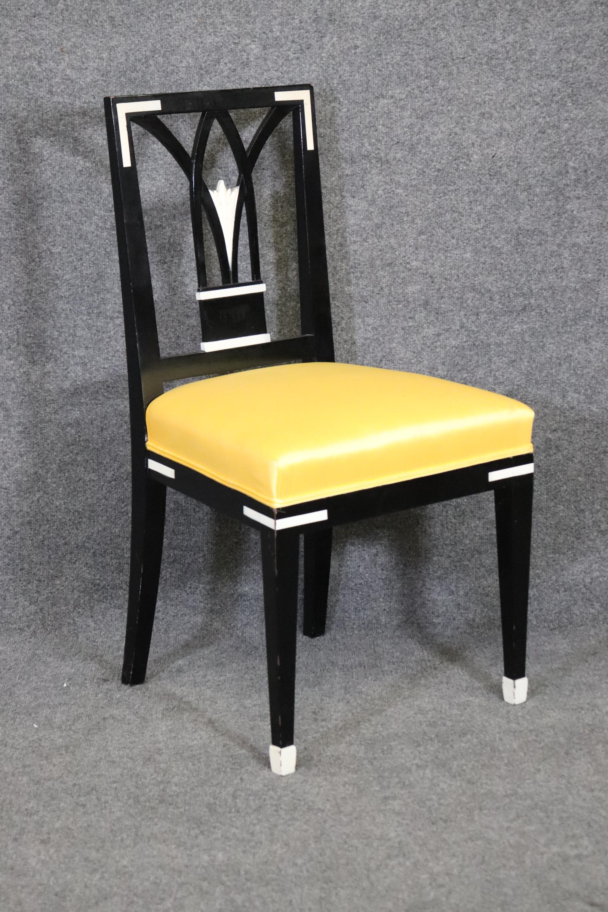 This is a beautiful set of chairs done in the Art Deco style with faux paint decorated ivory inlay. The inlay looks exactly like ivory but is painted not actual ivory nor inlay. But it looks so good you'll be hard-pressed to tell the difference. The