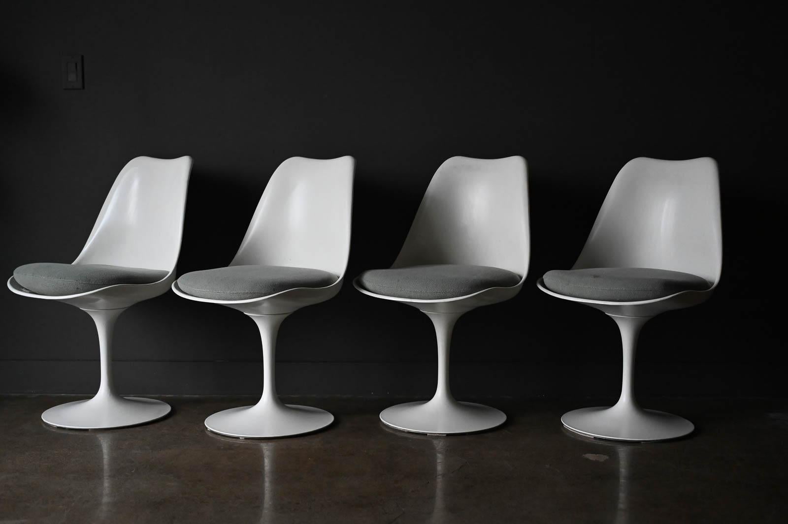 Set of 4 Eero Saarinen for Knoll Tulip Chairs, circa 1959. Set of 4 original armless tulip dining chairs with early Knoll Bowtie label dating to the late 1950s, early 1960s. These chairs are in very good vintage condition and have authentic seat