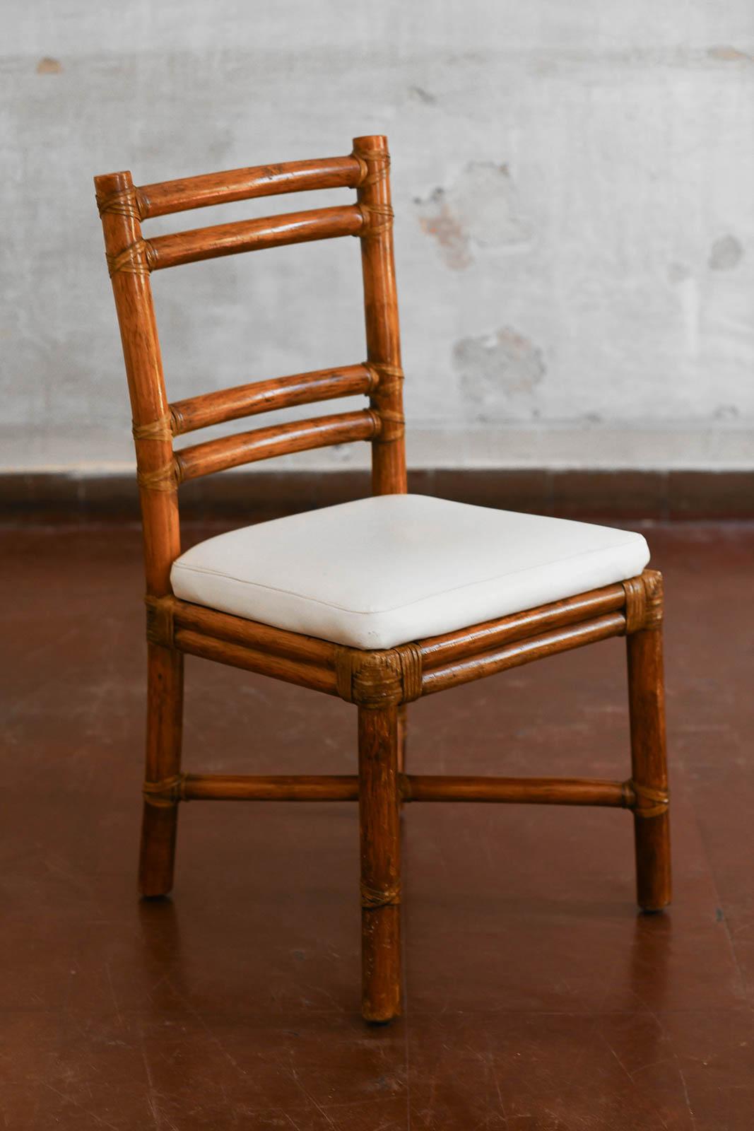 Italiano Set di 4 sedie John and Elinor McGuire in rattan, anni '70 in vendita