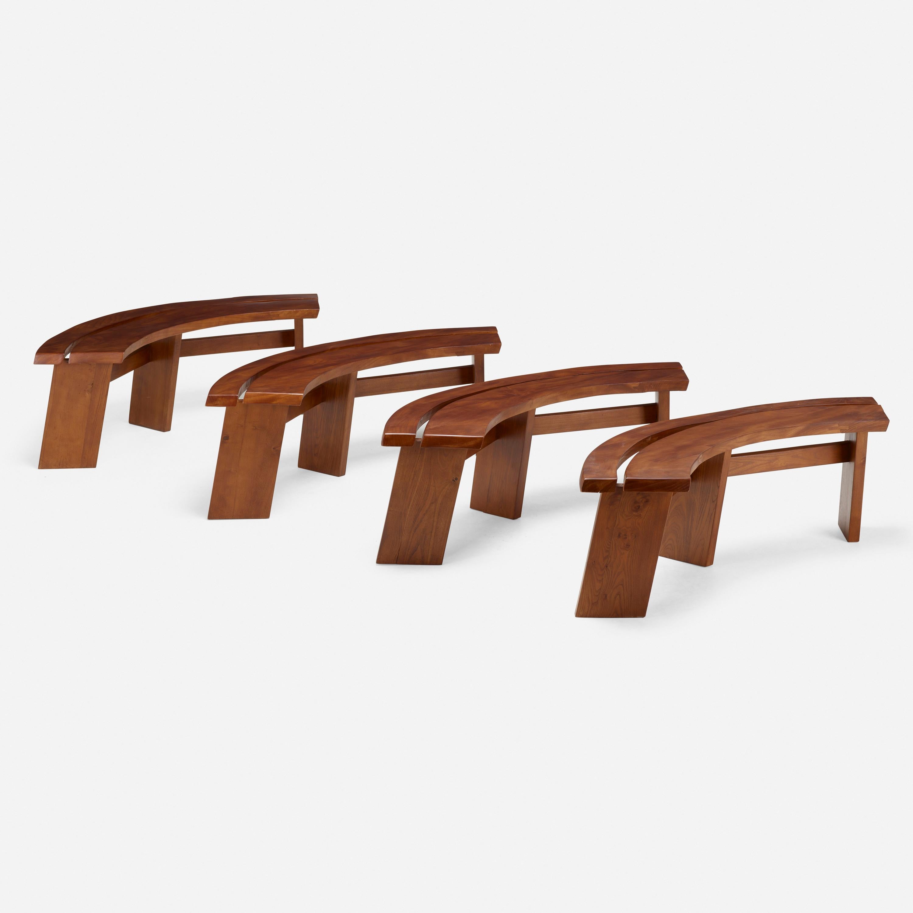 Set of four curved elm benches model S38 by Pierre Chapo.

