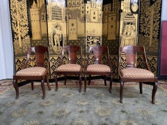 Lot de 4 fauteuils « gondola » de style Empire en acajou