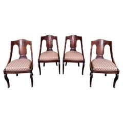 Lot de 4 fauteuils « gondola » de style Empire en acajou