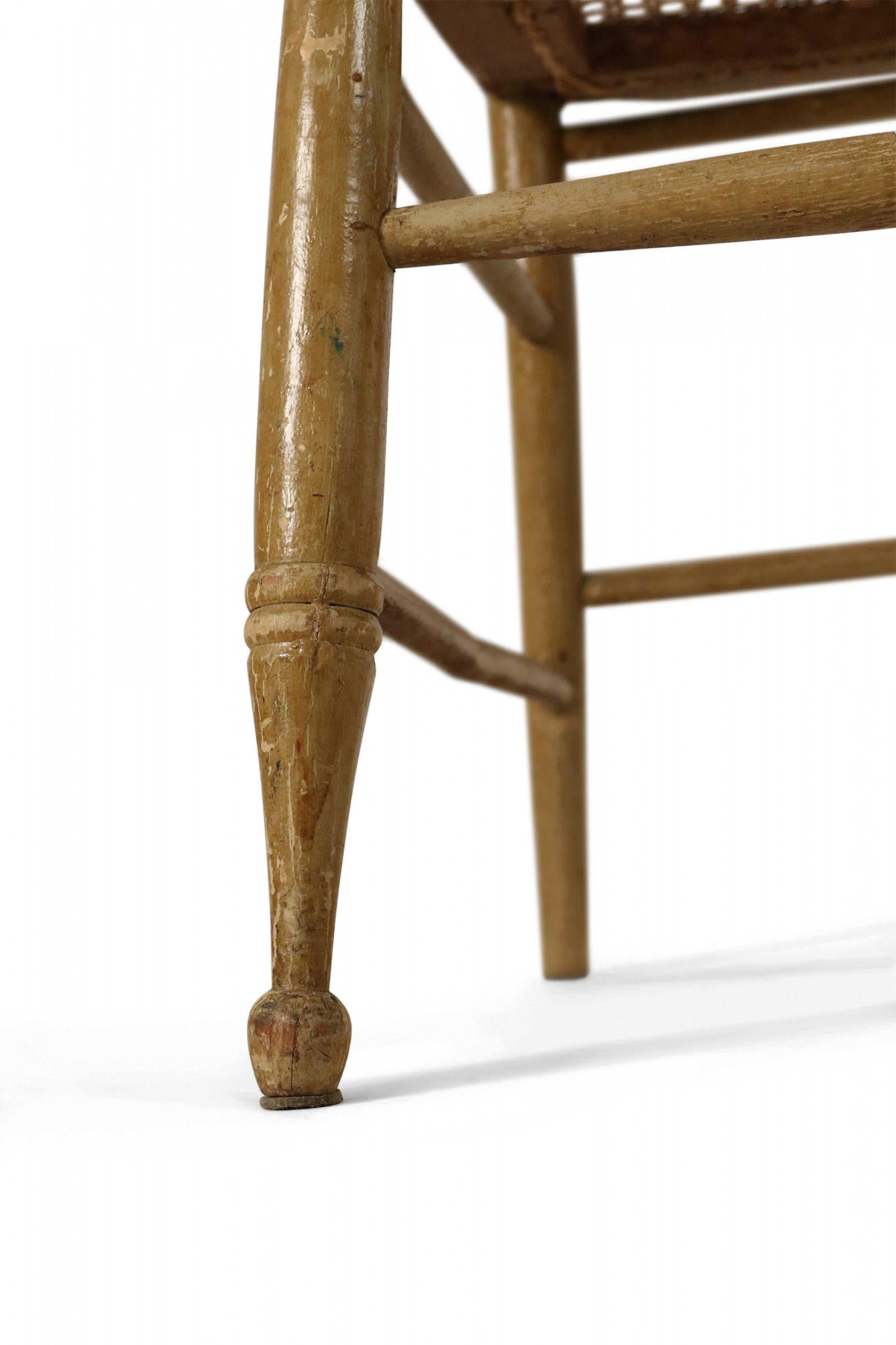 Set of 4 English Country-style wooden ladder back children's chairs with woven rush seats and antique painted medallion details. (PRICED AS Set)

Some variation in turned legs. Condition of painted finish varies.