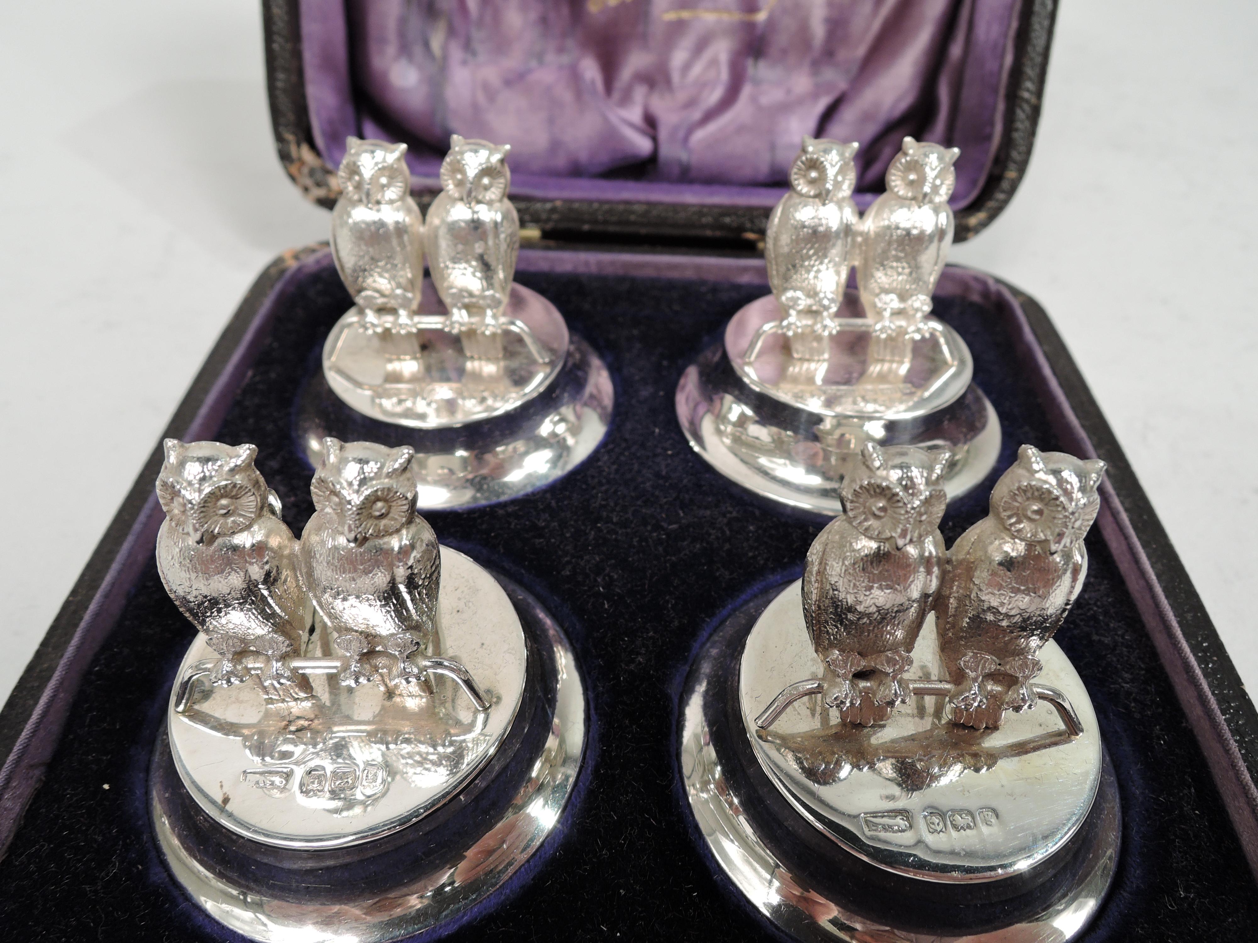 Set of 4 Edwardian sterling silver figural place card holders. Made by Levi & Salaman in Birmingham 1906. Each: Pair of perched owls with scrolled back clip on raised and round base. Wise birds standing ready to tamp down excessive dinner party