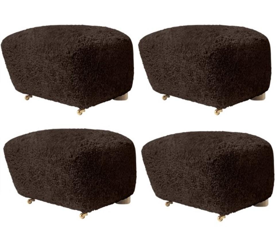 Set of 4 espresso natural oak sheepskin the tired man footstools by Lassen
Dimensions: W 55 x D 53 x H 36 cm.
Materials: Sheepskin.

Flemming Lassen designed the overstuffed easy chair, The Tired Man, for The Copenhagen Cabinetmakers’ Guild