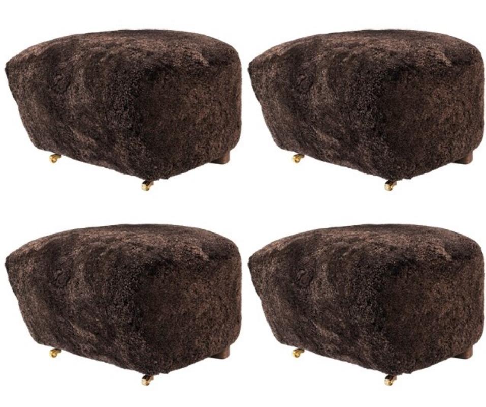Set Of 4 espresso smoked oak sheepskin the tired man footstools by Lassen
Dimensions: W 55 x D 53 x H 36 cm 
Materials: Sheepskin.

Flemming Lassen designed the overstuffed easy chair, The Tired Man, for The Copenhagen Cabinetmakers’ Guild