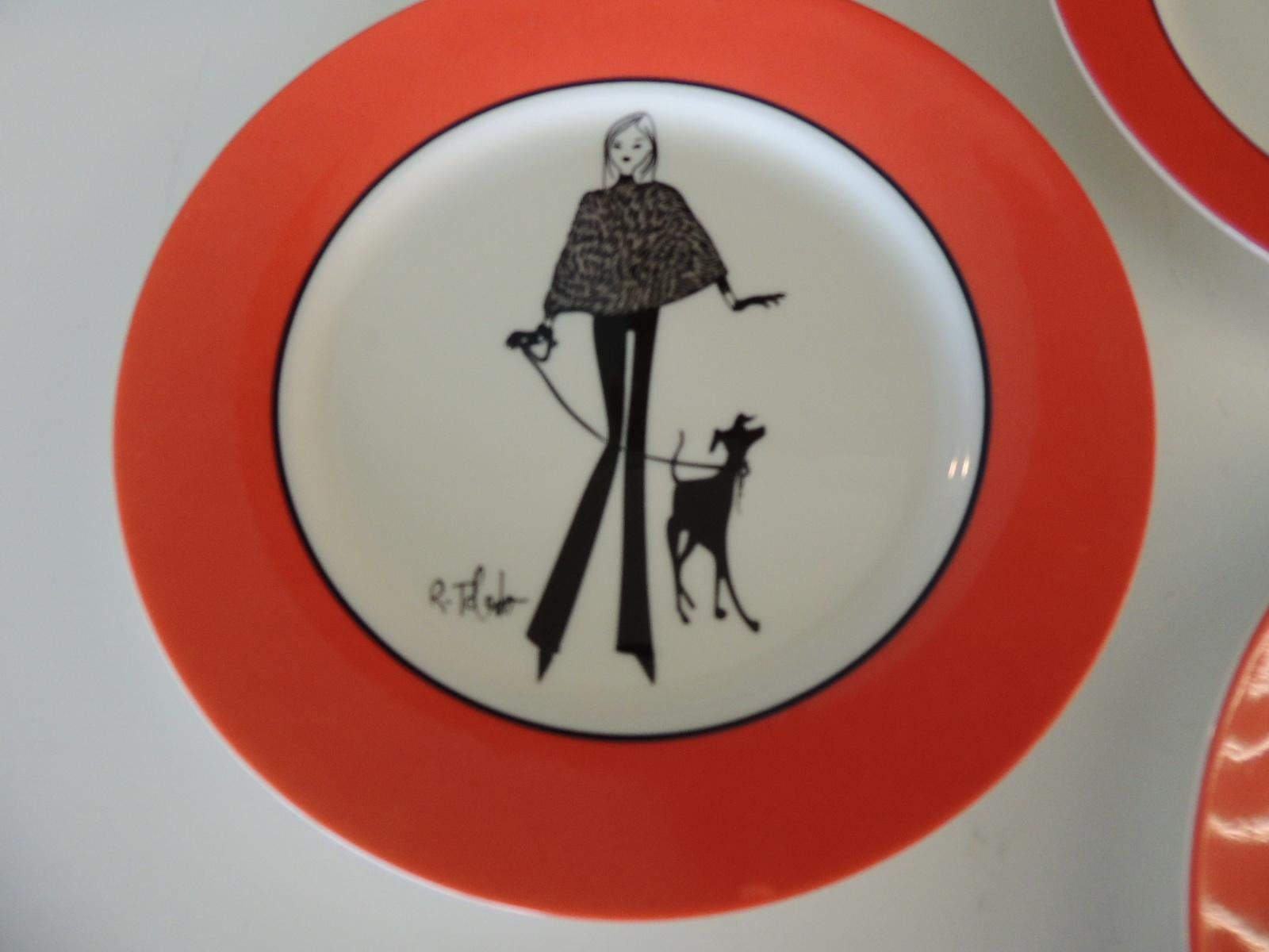 Orange rim plates with white background and black fashion illustrations.
Size: 8