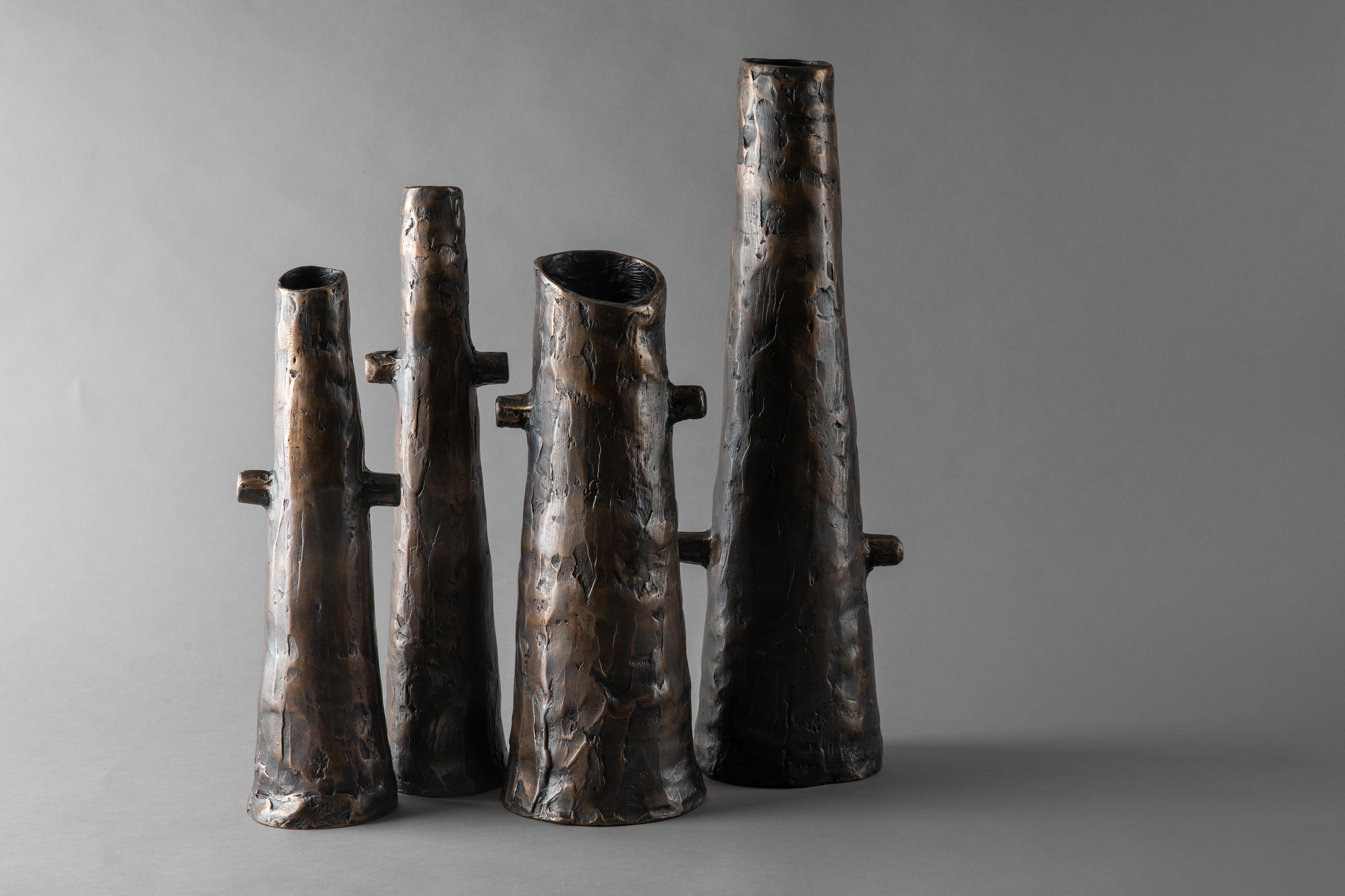 Set of 4 Figari vases by Jean Grisoni
Dimensions: H 48 x D 14, H 40 x D 9, H 36 x D 14, H 34 x D 9 cm
Materials: bronze

Patinated bronze vases.

Jean Grisoni
In recent years, art furniture has become Jean Grisoni’s territory of expression.
Bronze