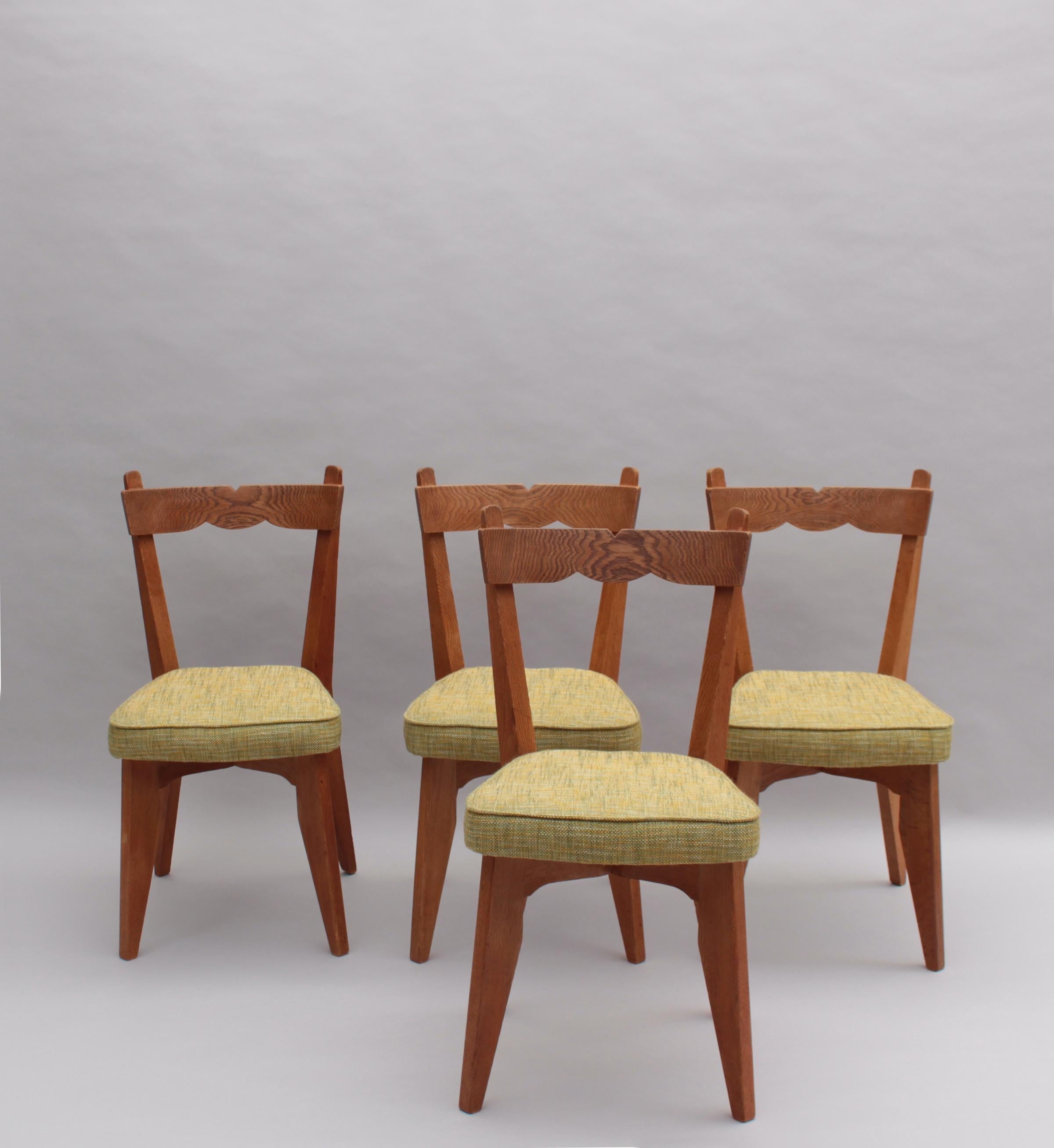 Robert Guillerme (1913-1990) and Jacques Chambron (1914-2001) for Votre Maison (editor) : A set of four fine French mid-century solid oak dining chairs 

A matching table is available (not included in price) see last pictures.
1stdibs ref#