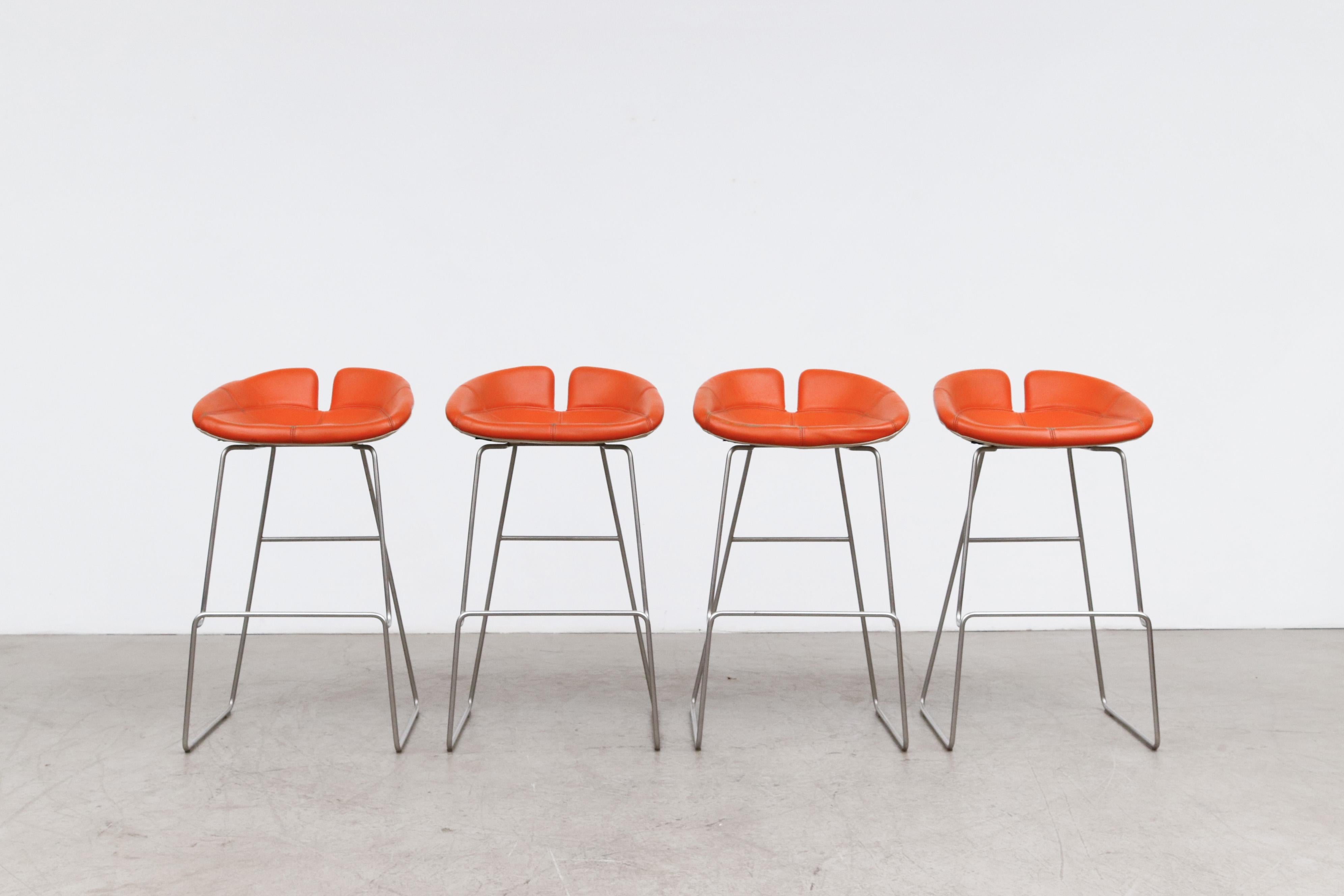 Mid-century MOD Style set of 4 Fjord leather bar stools by Patricia Urquiola for Moroso, Italy. circa 2000. In original condition with normal wear for their age and use. Set price.