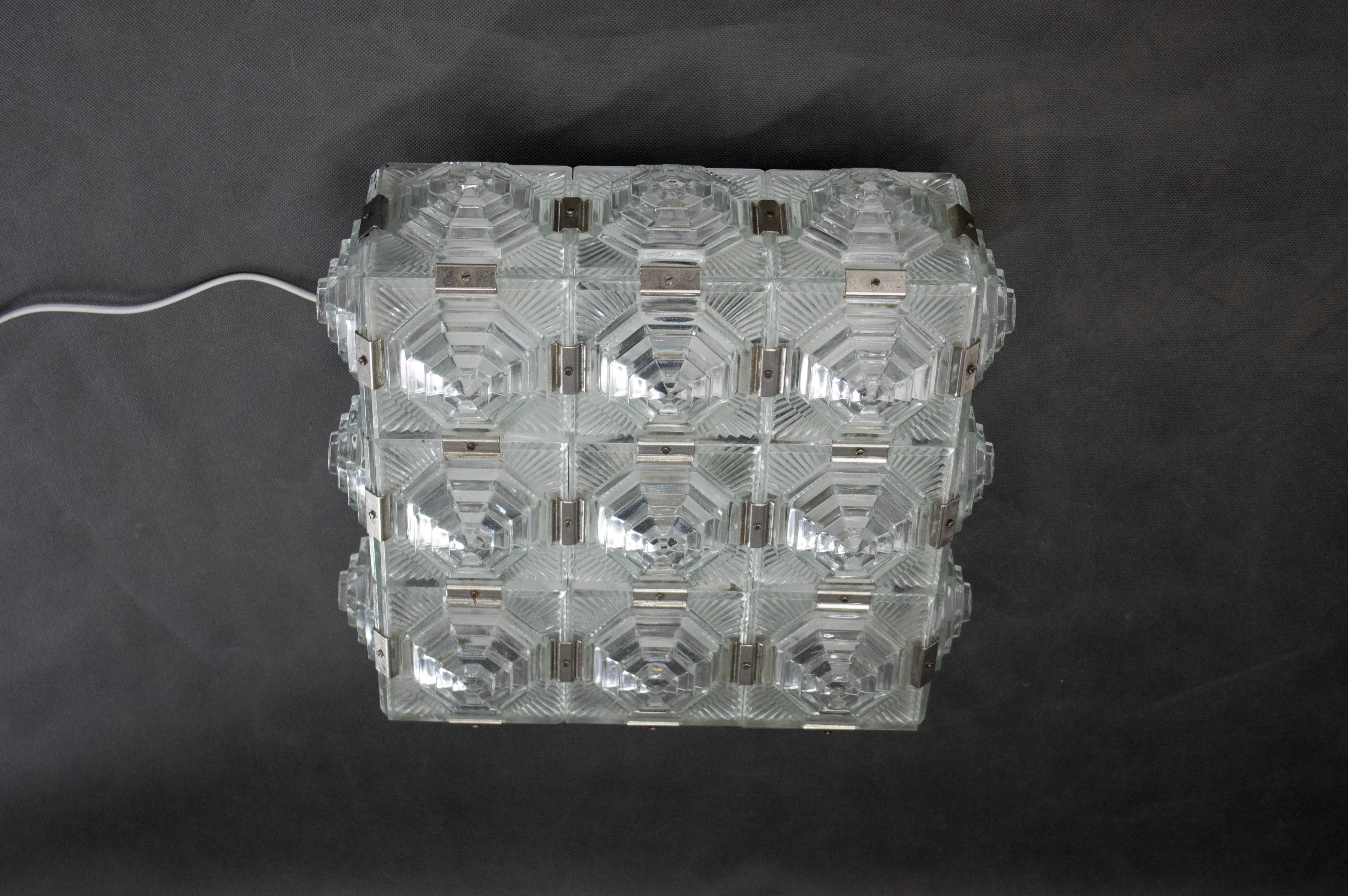 Set of four beautiful brutalist lfush mounts designed by Jaroslav Bejvl and made by Kamenicky Senov in 1970s.
Price per one set.
Two sets available.
Very well preserved.
Rewired:
4x40W, E25-E27 bulbs
US wiring compatible.
Shipping quote on request