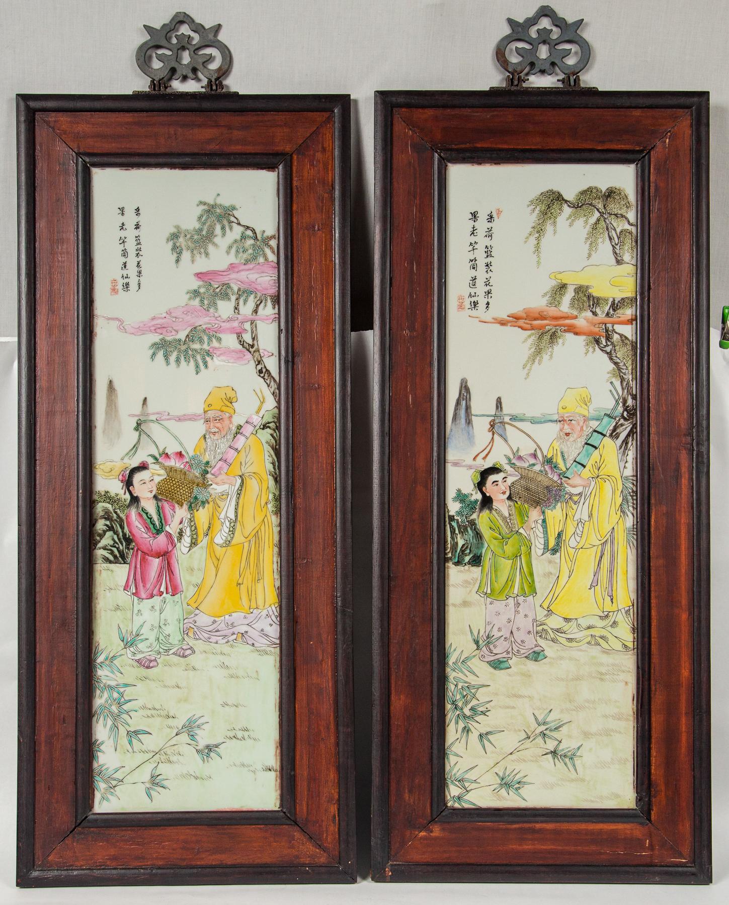 Wooden frames around the 4 plaques, each depicting different figures in a landscape setting.