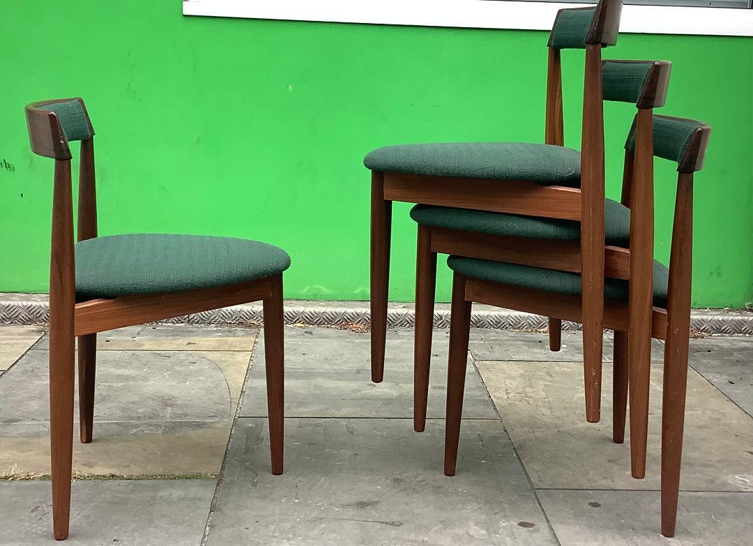 Classic set 4 tripod dining stackable chairs in teak produced by Frem Rojle
designed by Hans Olsen