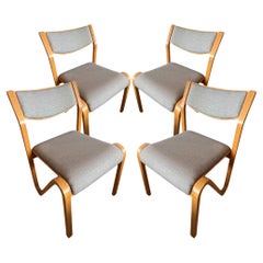 Ensemble de 4 chaises empilables françaises des années 1960 à la manière d'Alvar Alto