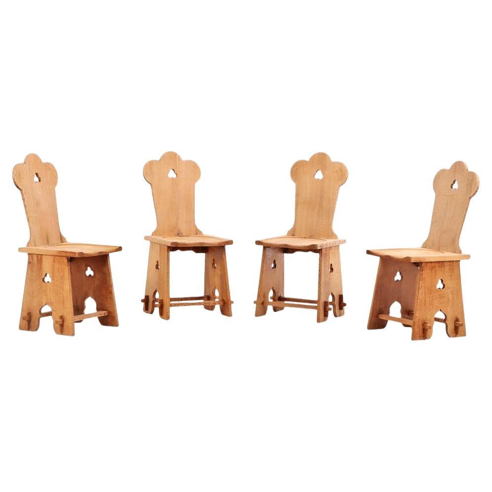 Set of 4 French Brutalist carved oak chairs, C. 1940. For Sale