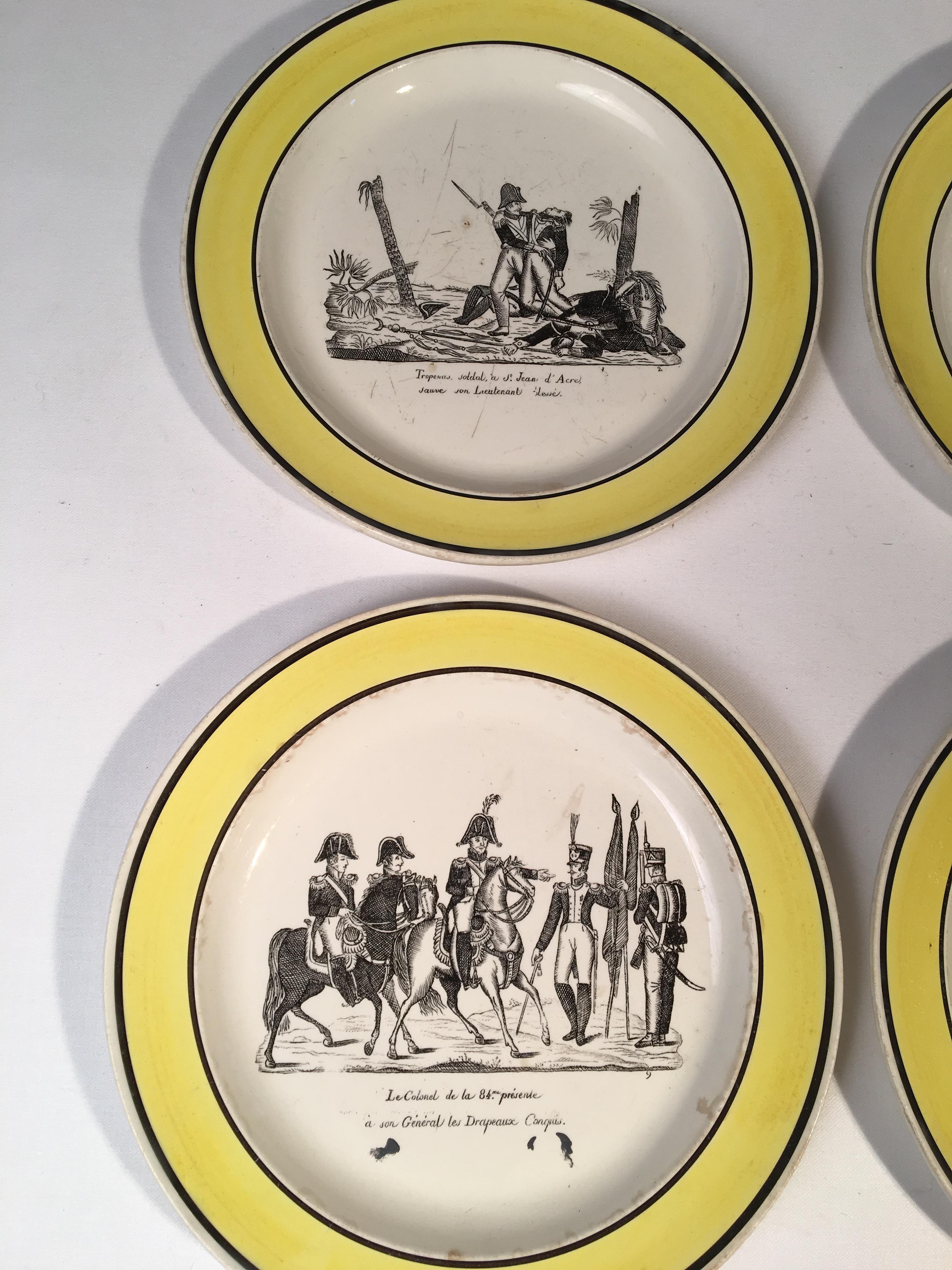 A set of 4 ceramic transfer-ware plates with French Empire military theme decoration, yellow and black glazed stamped on reverse Choisy.