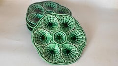 Satz von 4 französischen grünen Majolikatellern - Sarreguemines Manufaktur - 20. Jahrhundert