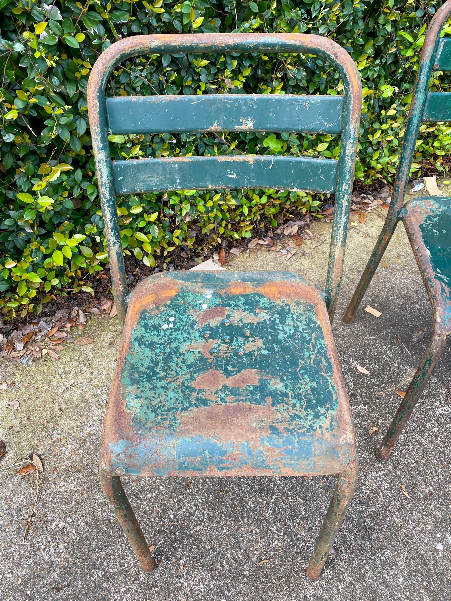 Set of 4 French Industrial Painted Metal Stacking Chairs, circa 1960s In Fair Condition In Houston, TX