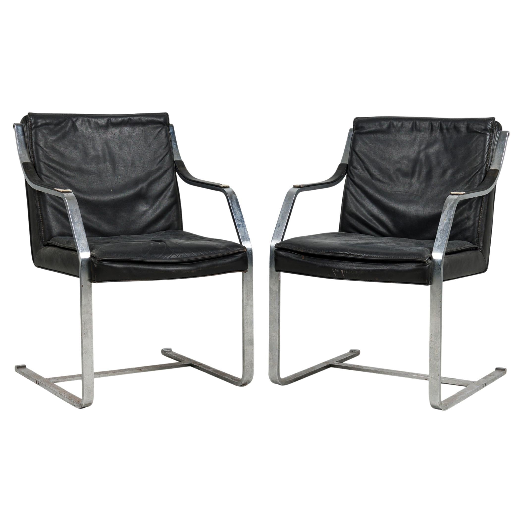 Set of 4 French Mid-Century Steel and Black Leather Armchairs by Maison Jansen For Sale