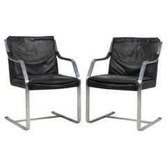 Retro Set of 4 French Mid-Century Steel and Black Leather Armchairs by Maison Jansen