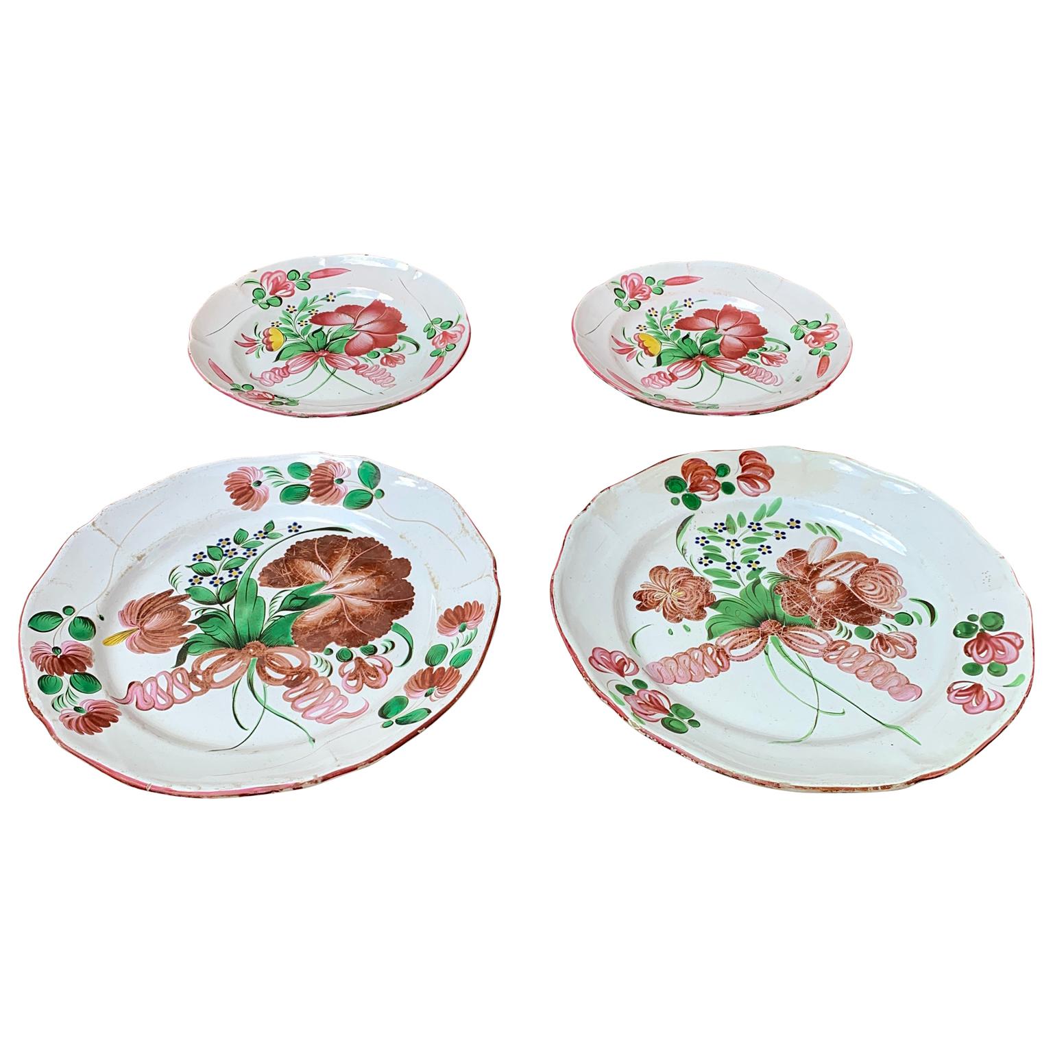 Two large French Faience dishes and two smaller from the city of Strasbourg in hand painted floral decoration. They are approximately from around 1800. The diameter of the largest pair is 30 cm.



 