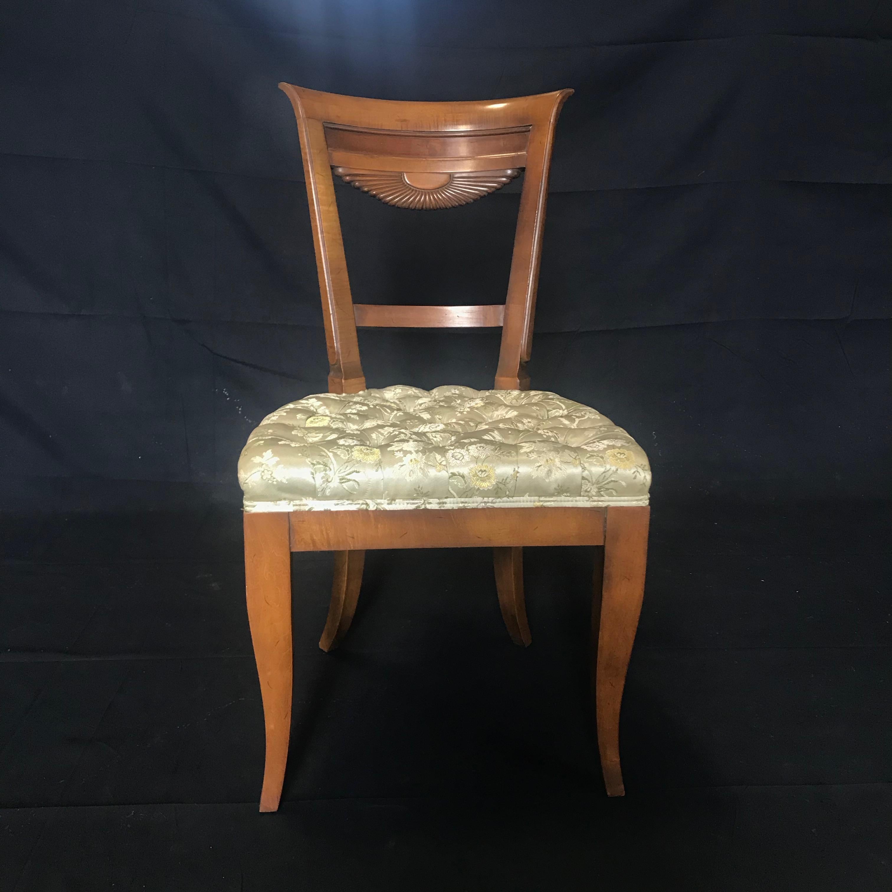 Set of four French walnut midcentury dining chairs with a beautiful fan back design and turned legs, upholstered in a neutral immaculate tufted tapestry silk. 
#4989

Measures: H seat 18.5”.