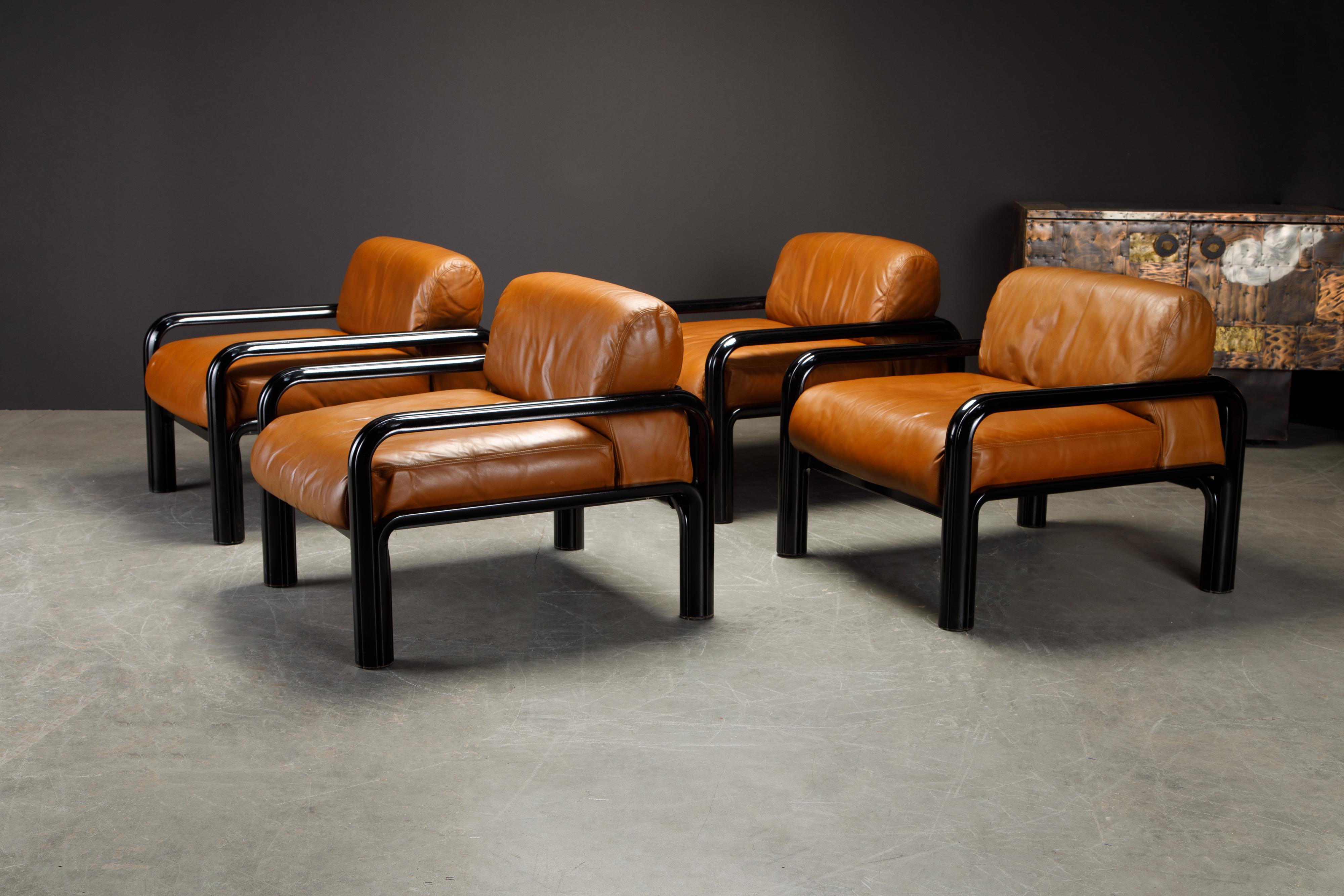 An incredible collectors set of four (4) signed Gae Aulenti for Knoll International lounge chairs, signed and date stamped October 6 1980, the same great year that brought us The Blues Brothers, Friday the 13th, Caddyshack, Airplane! and The Empire