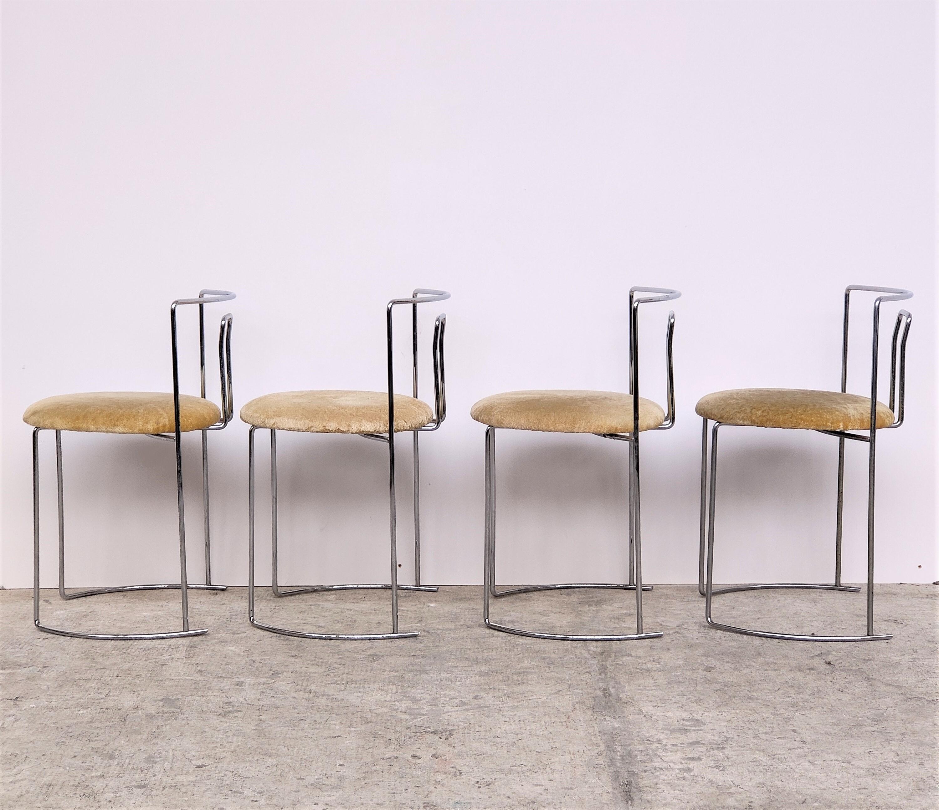 Extremely rare set of 4 dining chairs Gaja model, designed by the Japanese architect Kazuhide Takahama.
Steel chromed frame, fabric seat.
Chair with a light and sinuous shape that enhances its elegance.
In very good original
