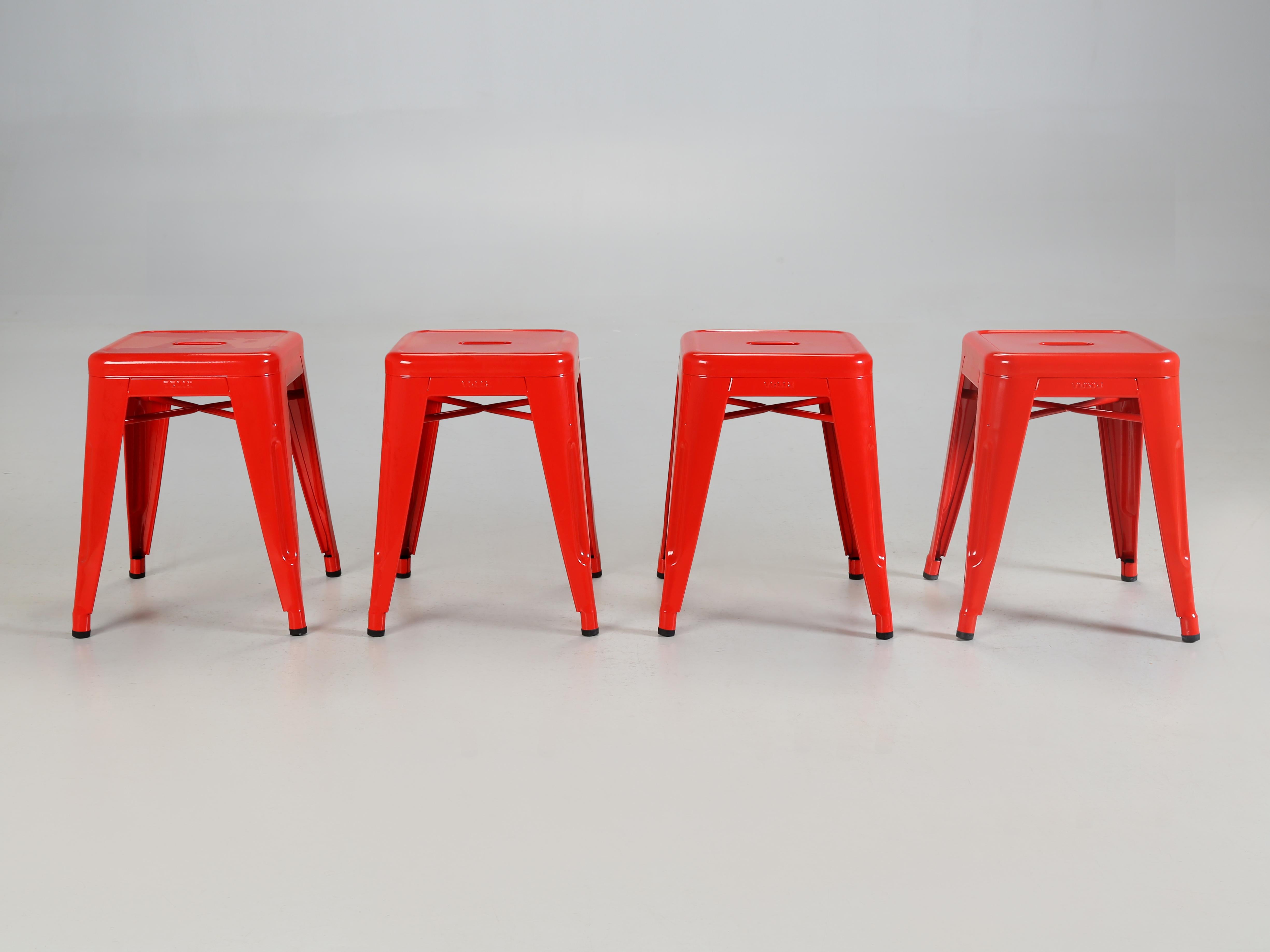 Set of (4) Genuine French Tolix Steel Stacking Stools in Chile Pepper Red. The Tolix Stools are a shade under 18