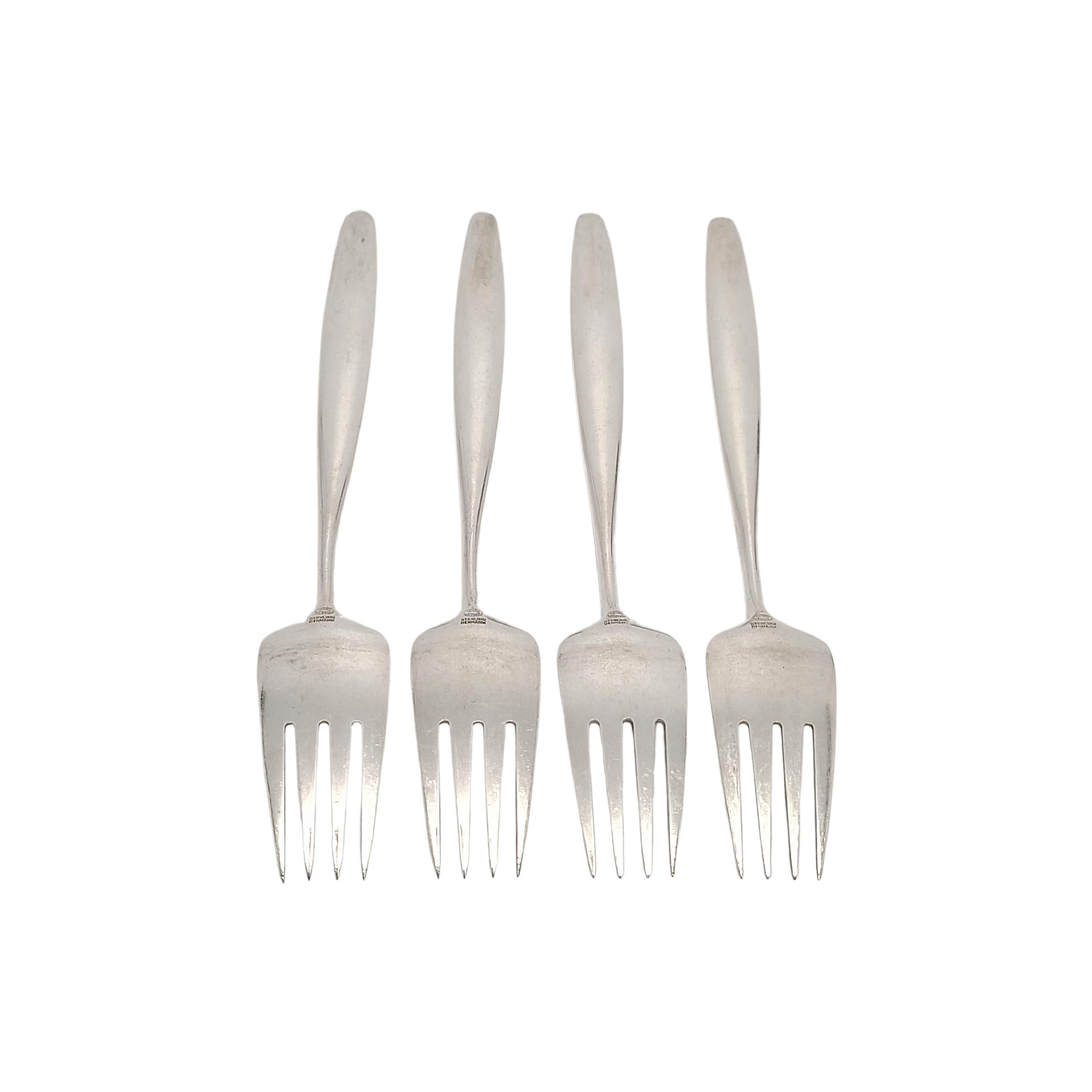 Set of 4 sterling silver dinner forks in the Cypress pattern by Georg Jensen

The Cypress pattern was designed by Tias Eckhoff in 1953 and won a gold medal for design in 1954. Its mid-century design is a timeless classic.

Measures approx 7 1/2