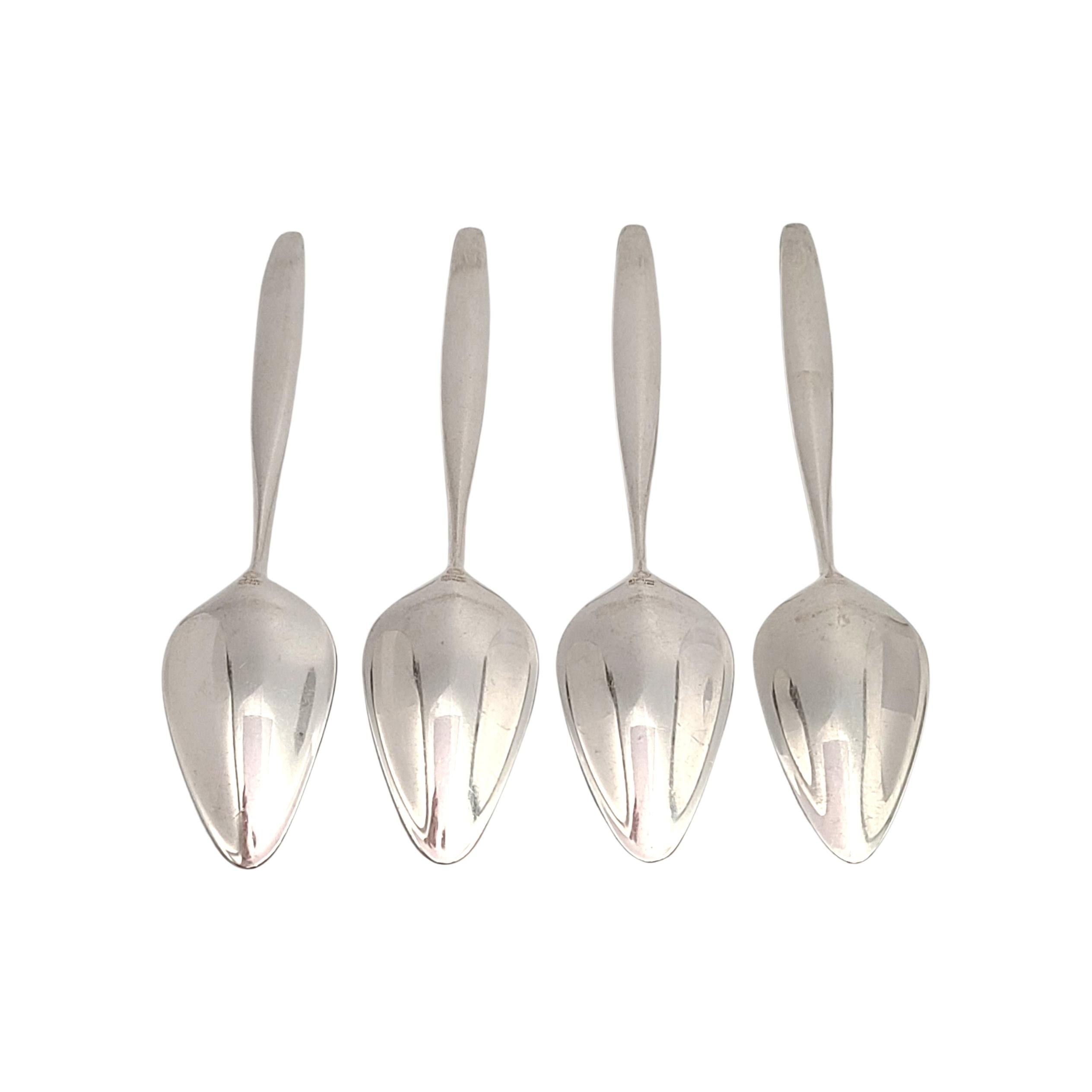 Set of 4 sterling silver fruit/orange spoons in the Cypress pattern by Georg Jensen

The Cypress pattern was designed by Tias Eckhoff in 1953 and won a gold medal for design in 1954. Its mid-century design is a timeless classic.

Measures approx 6