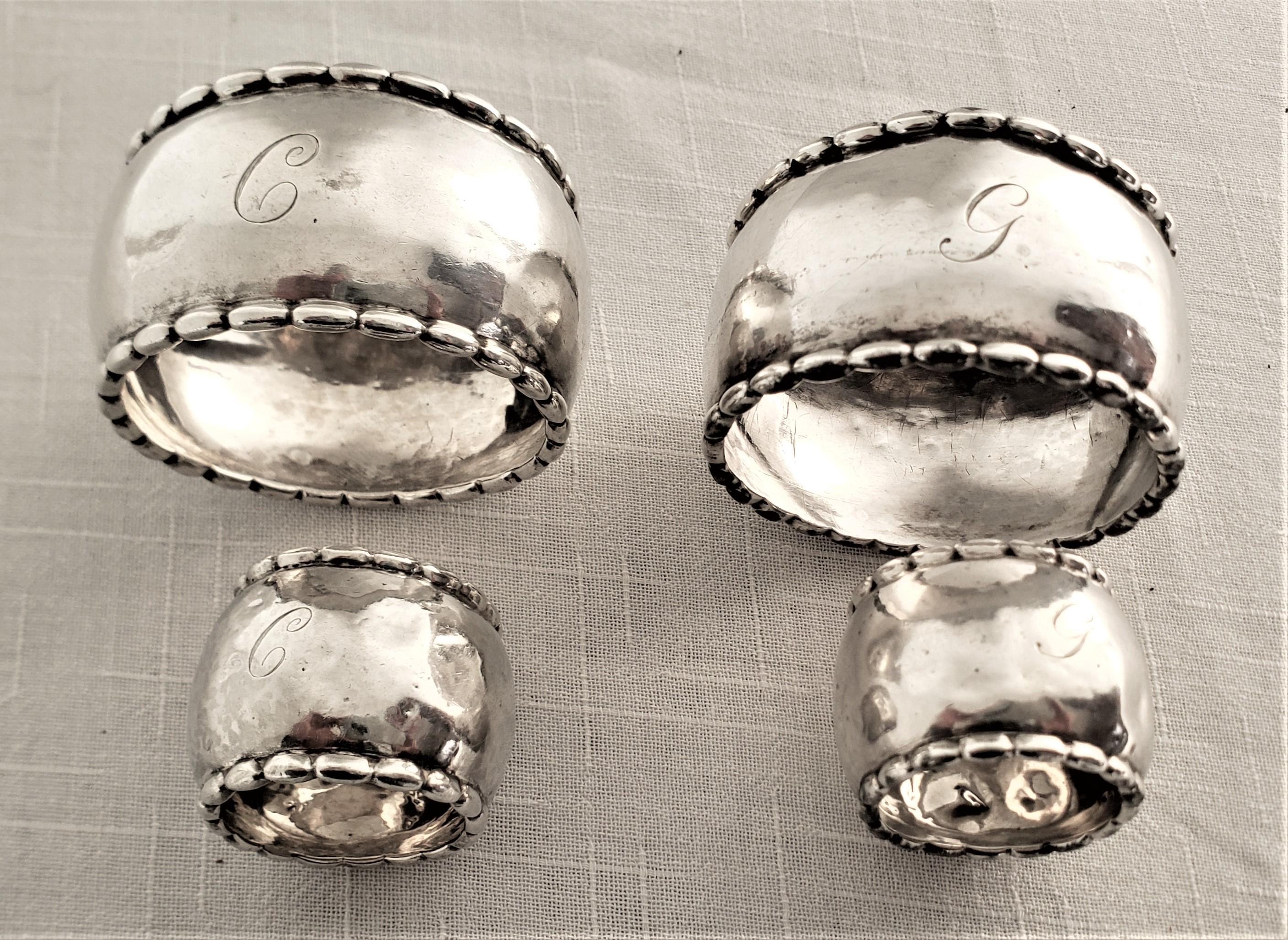 Art Deco Set of 4 Georg Jensen Sterling Silver Hand Hammered Napkin Rings For Sale