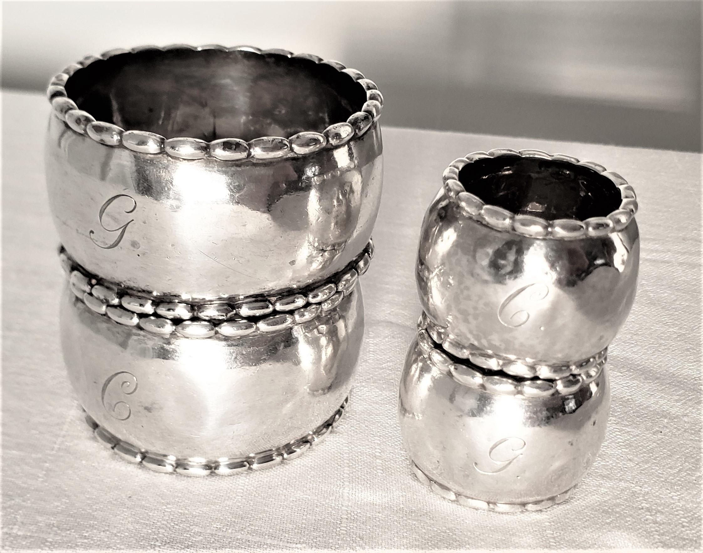 Art Deco Set of 4 Georg Jensen Sterling Silver Hand Hammered Napkin Rings For Sale